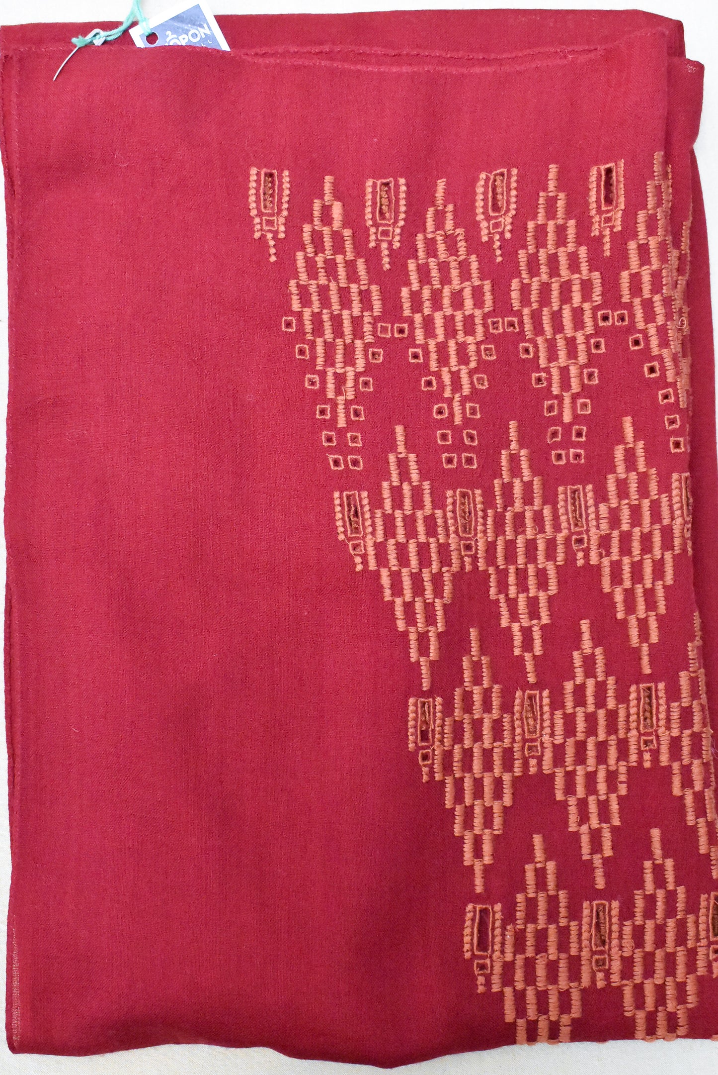 Long red embroidered scarf