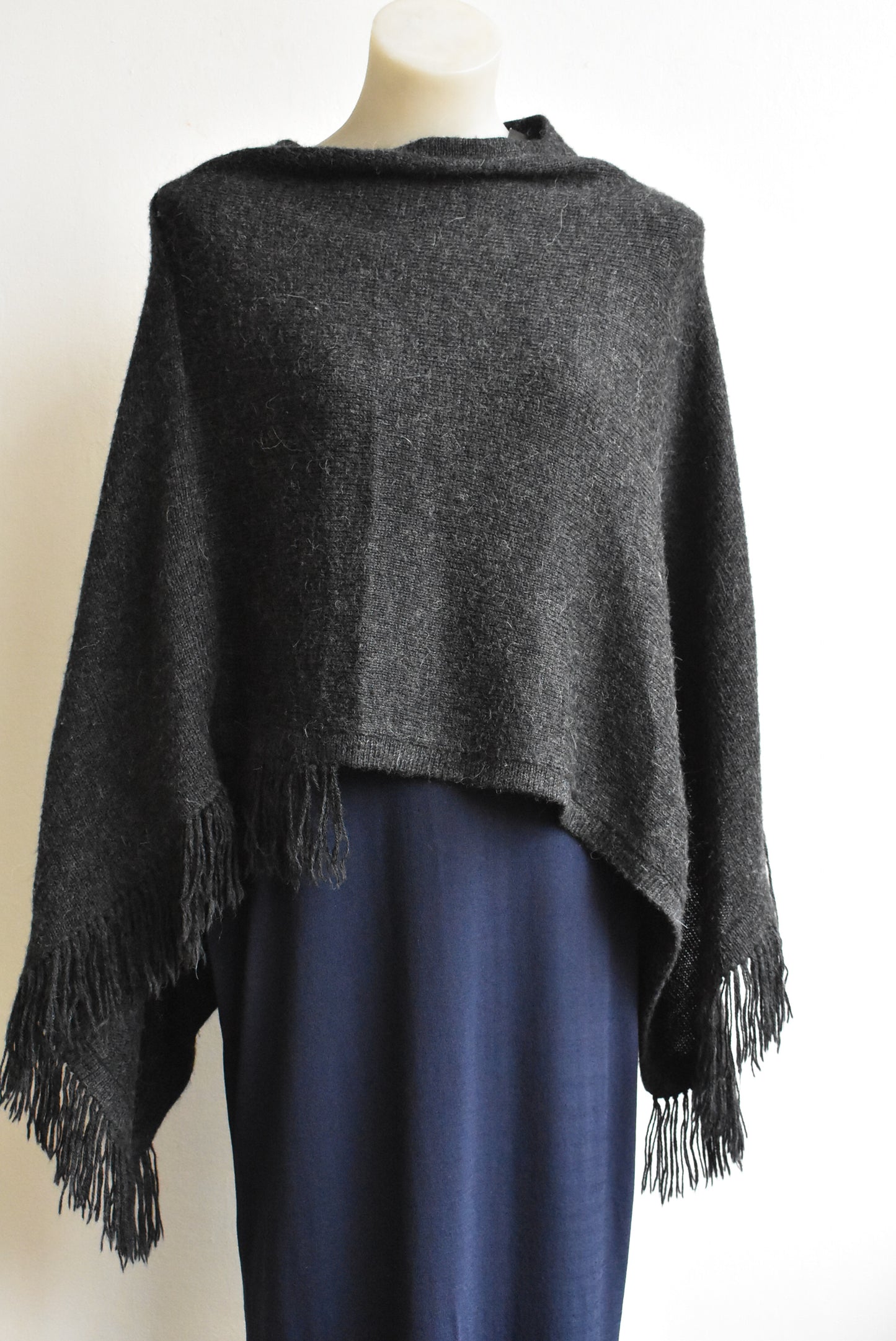 Grey fringed poncho