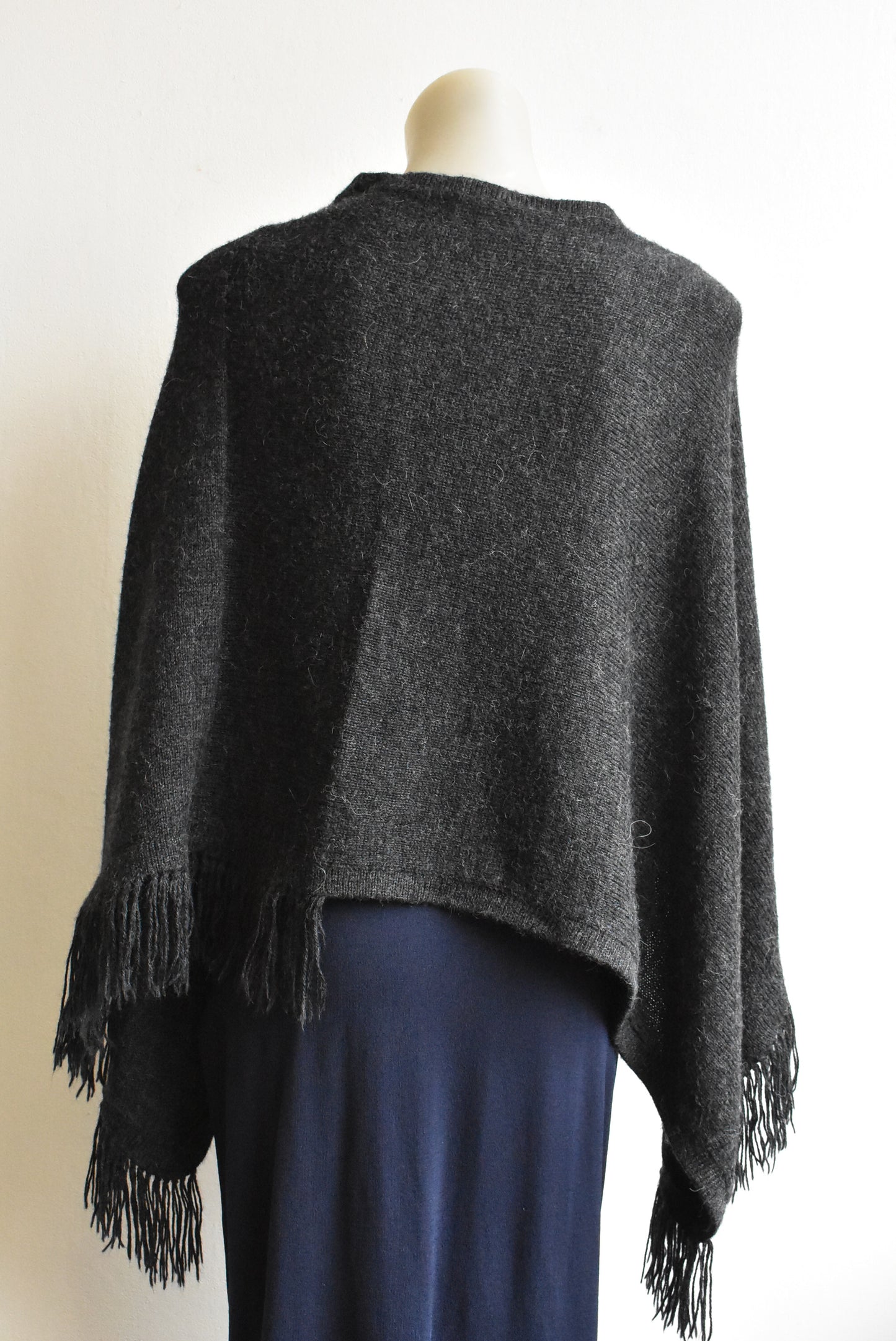 Grey fringed poncho