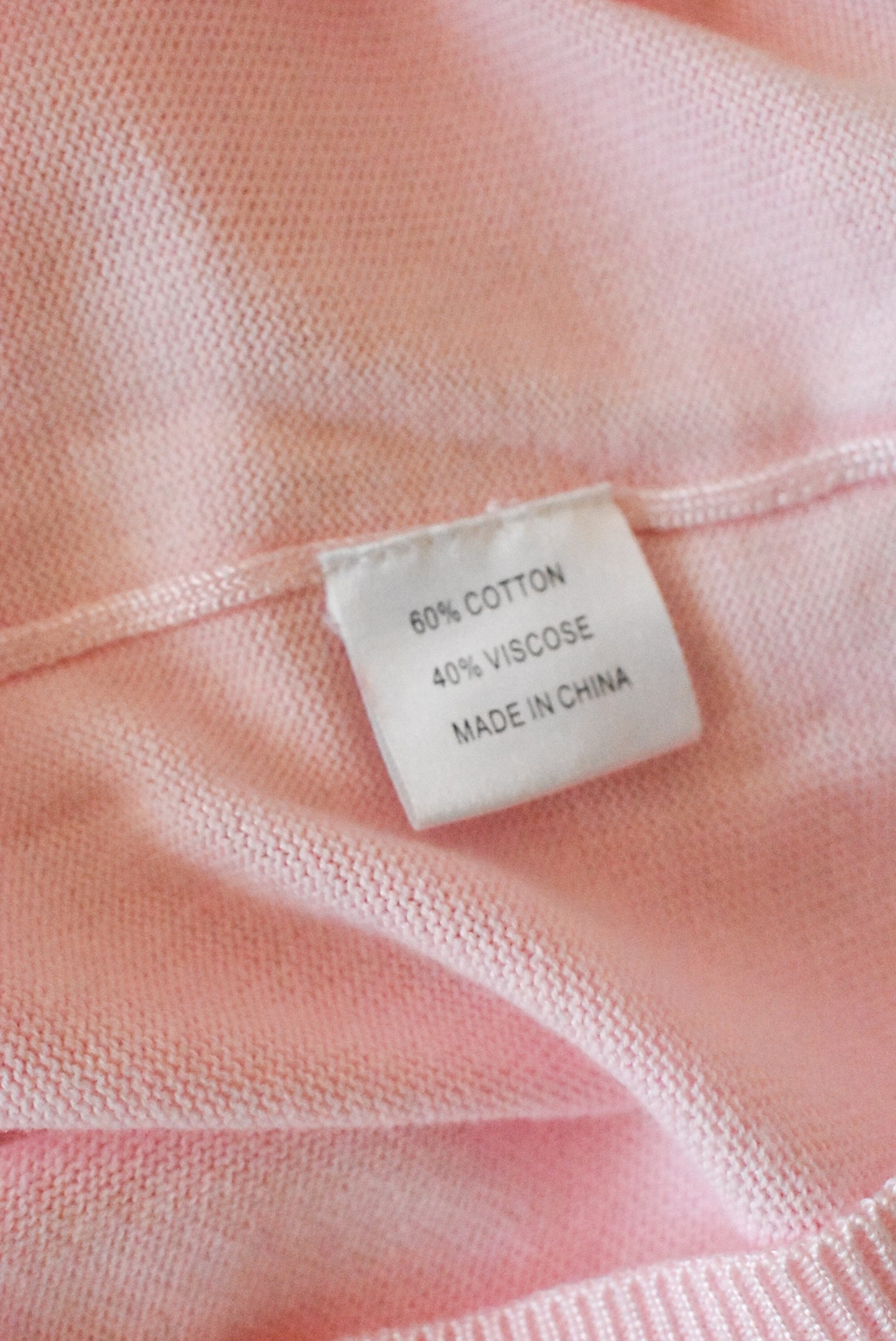 Slade retro-style baby pink knit, size 10