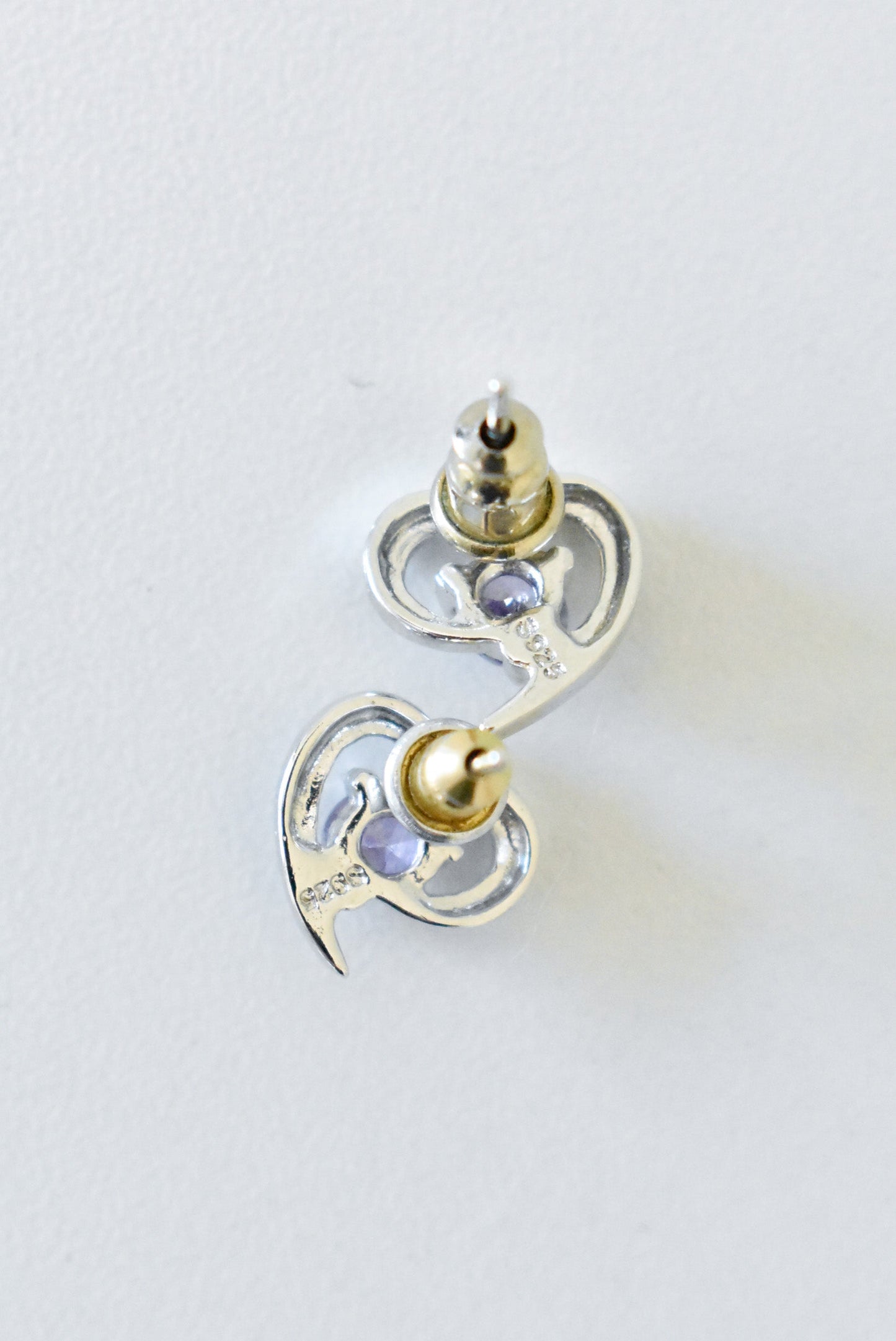 Silver heart earrings with purple gemstones