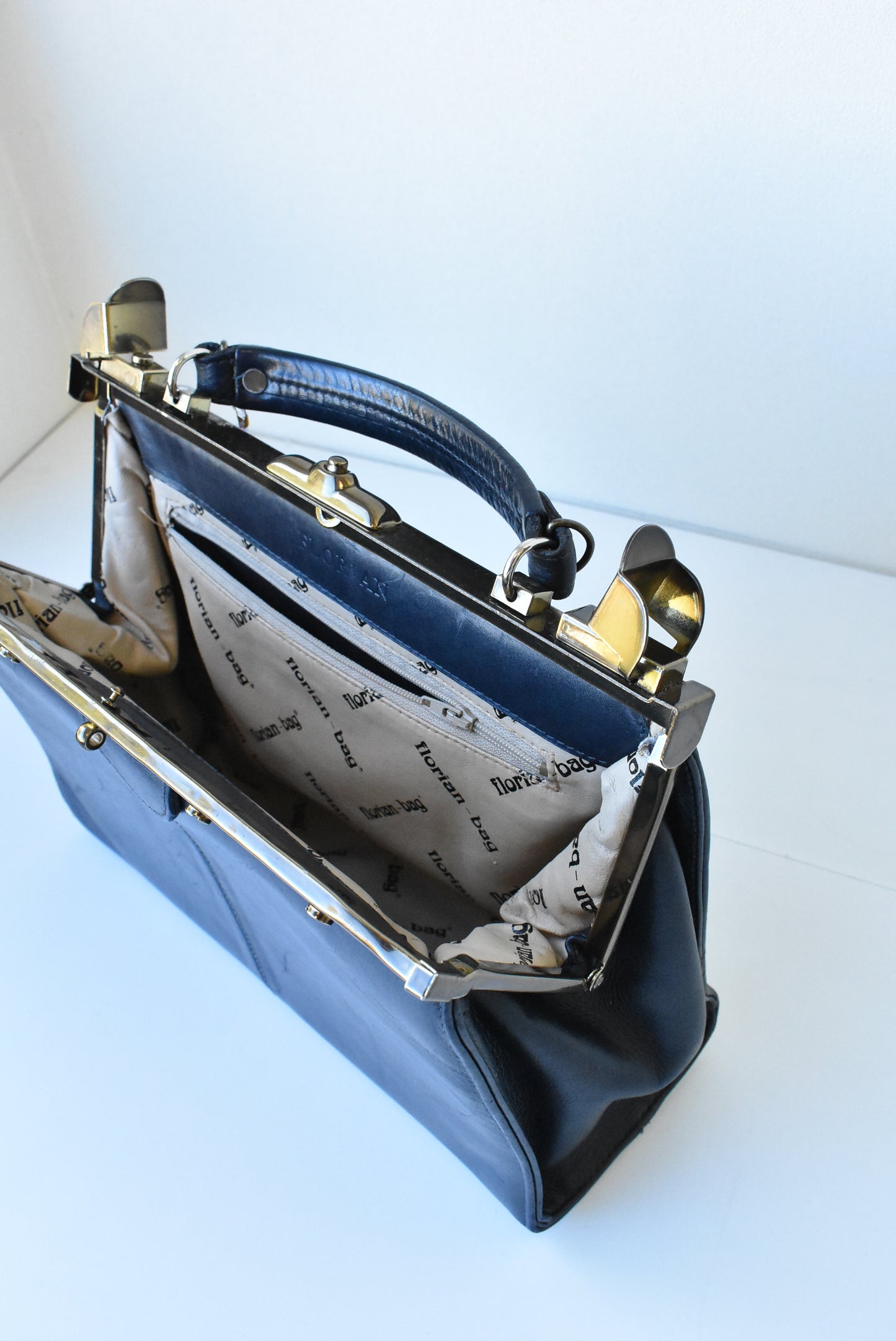 Florian (faux?) dark navy handbag