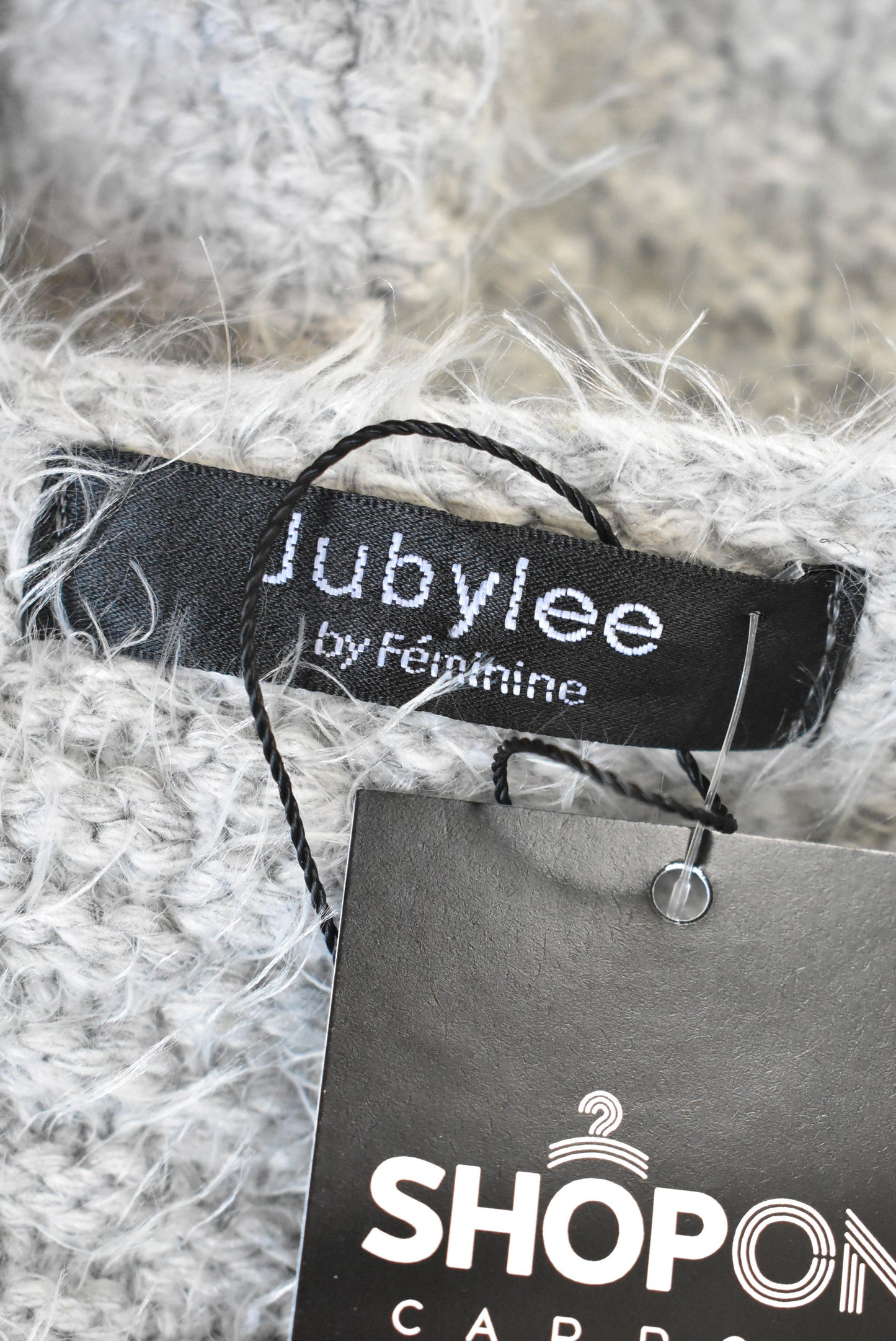 Jubylee fluffy coat with unique zip design, size M