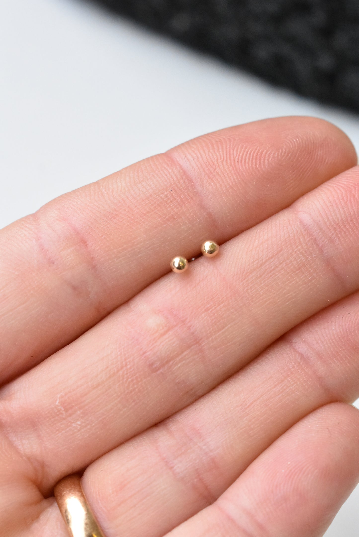 Tiny 14ct gold stud earrings