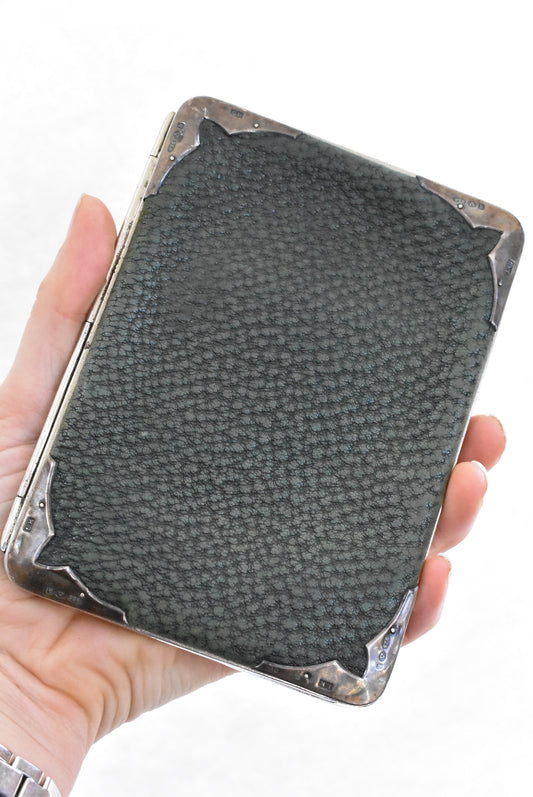 Antique leather and silver wallet
