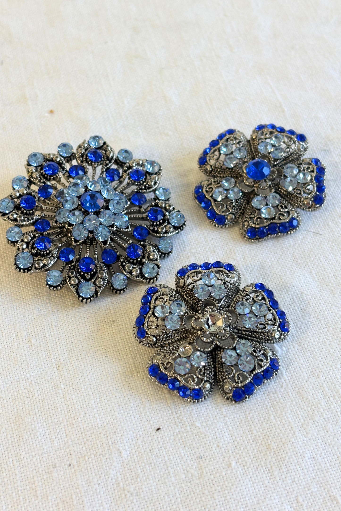 Glitzy blue brooch bundle