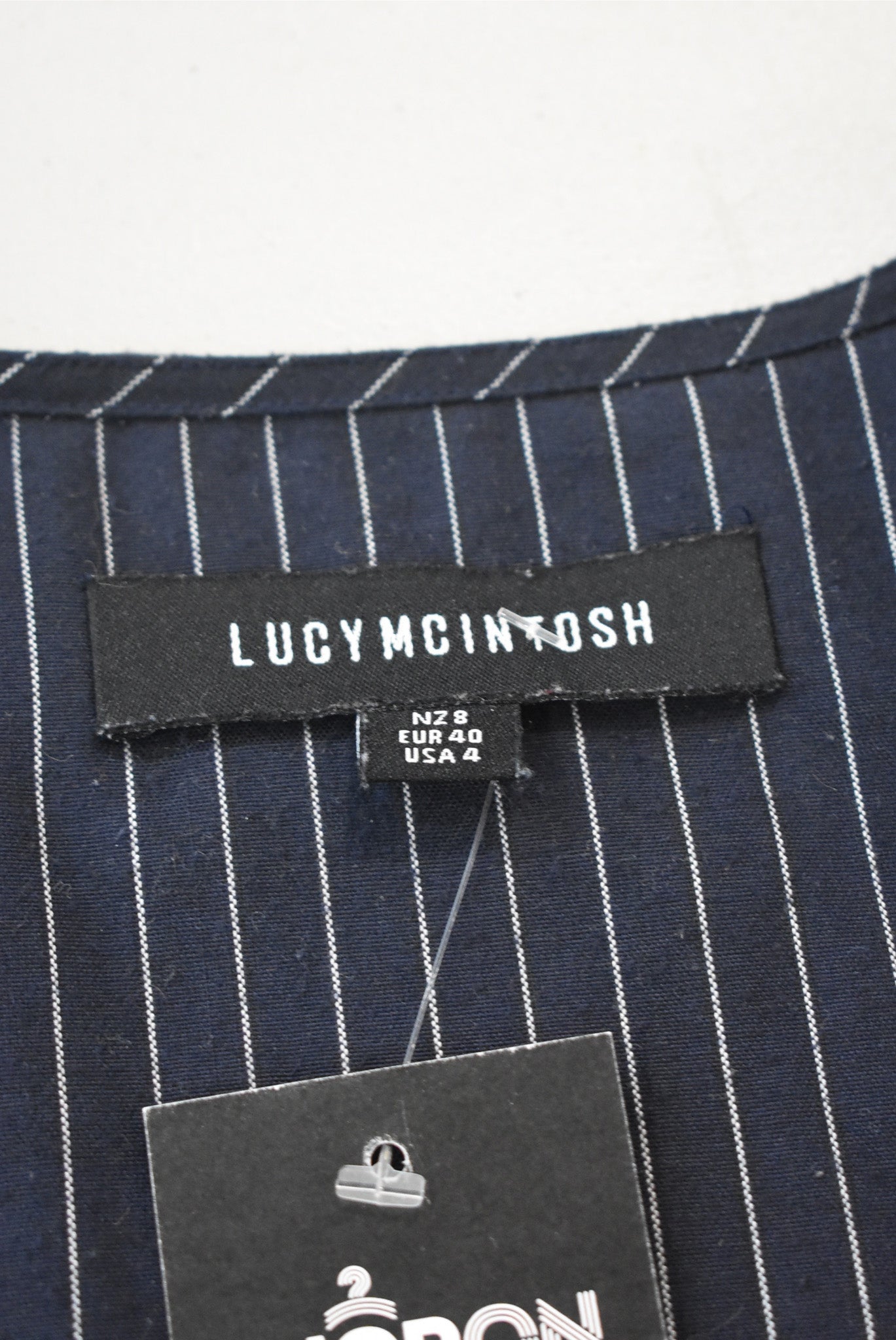 Lucy Mcintosh navy pinstripe flared sleeve blouse, 8