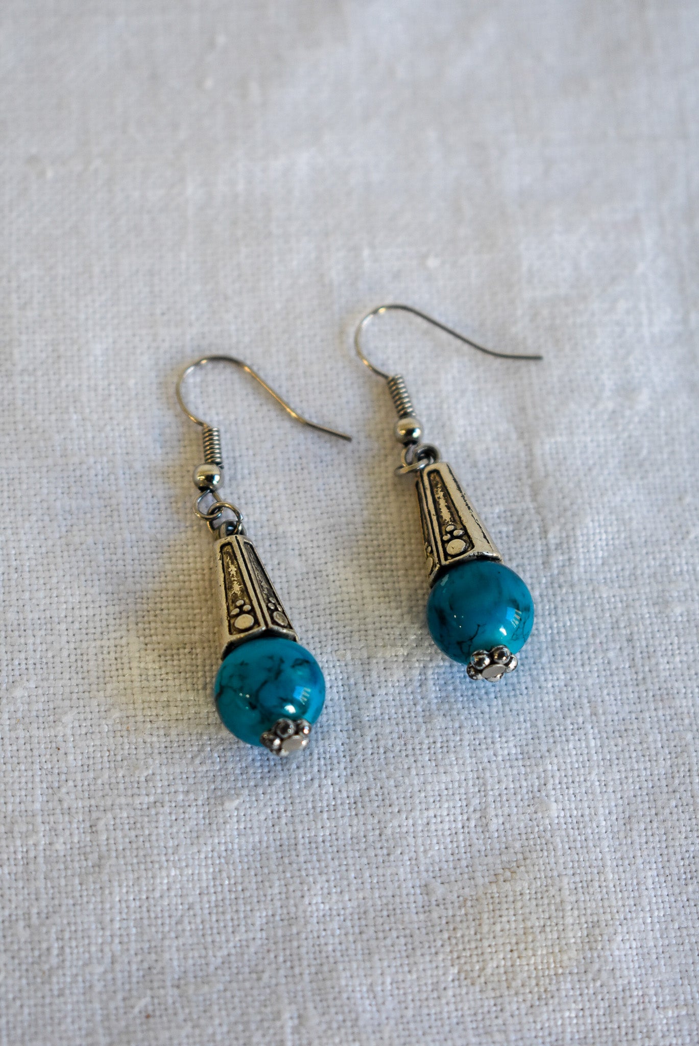 Glass bead dangly earrings