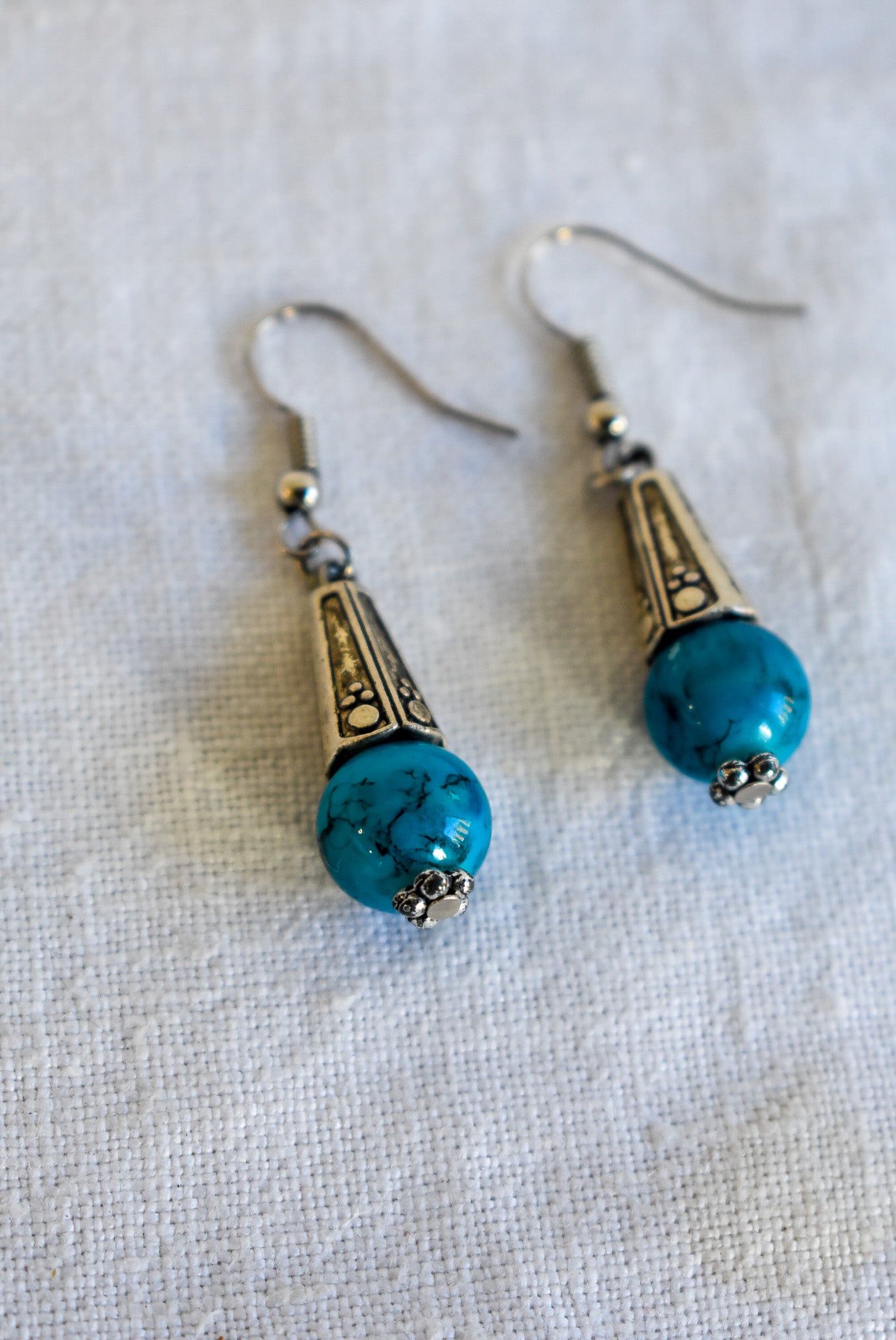 Glass bead dangly earrings
