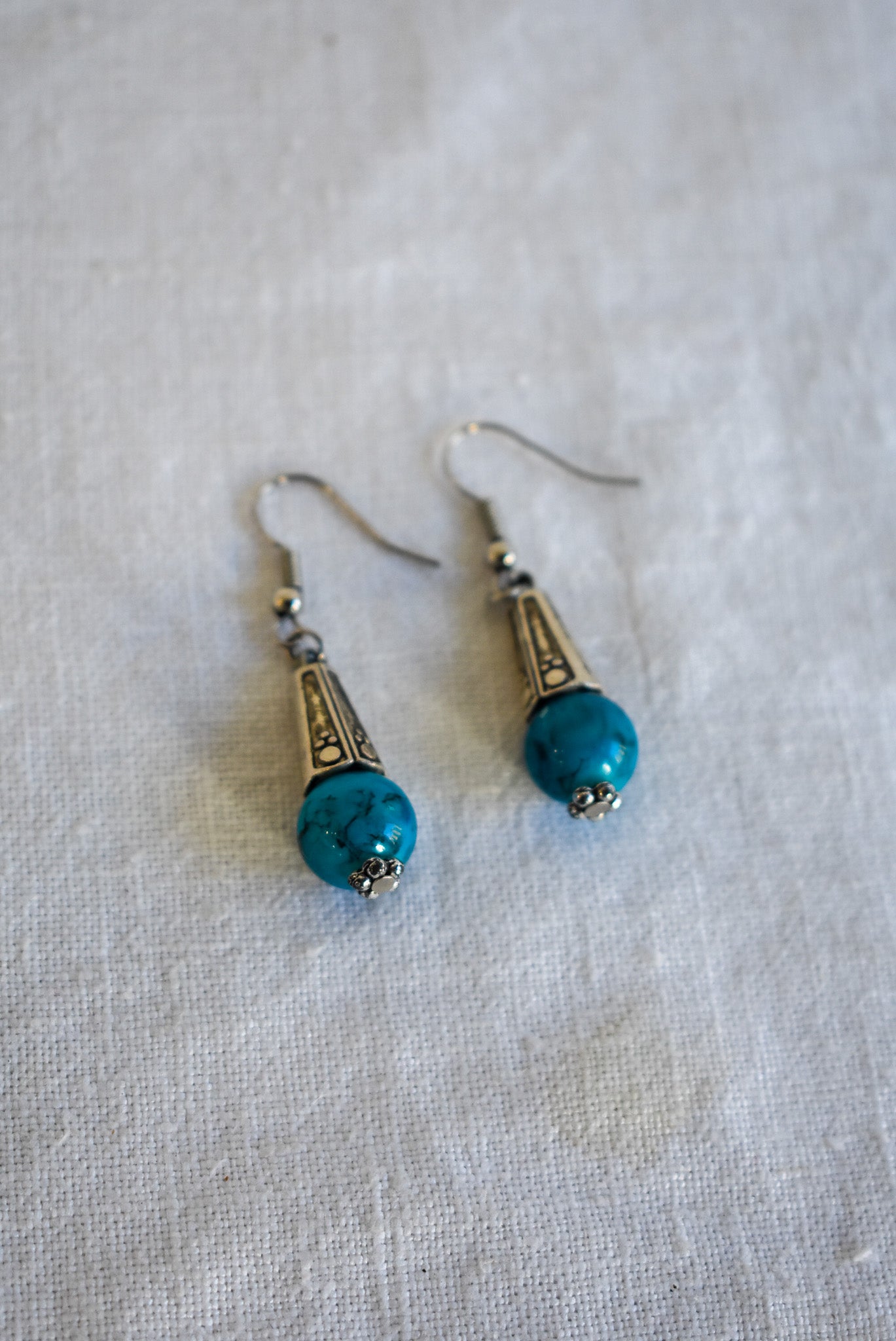 Glass bead dangly earrings