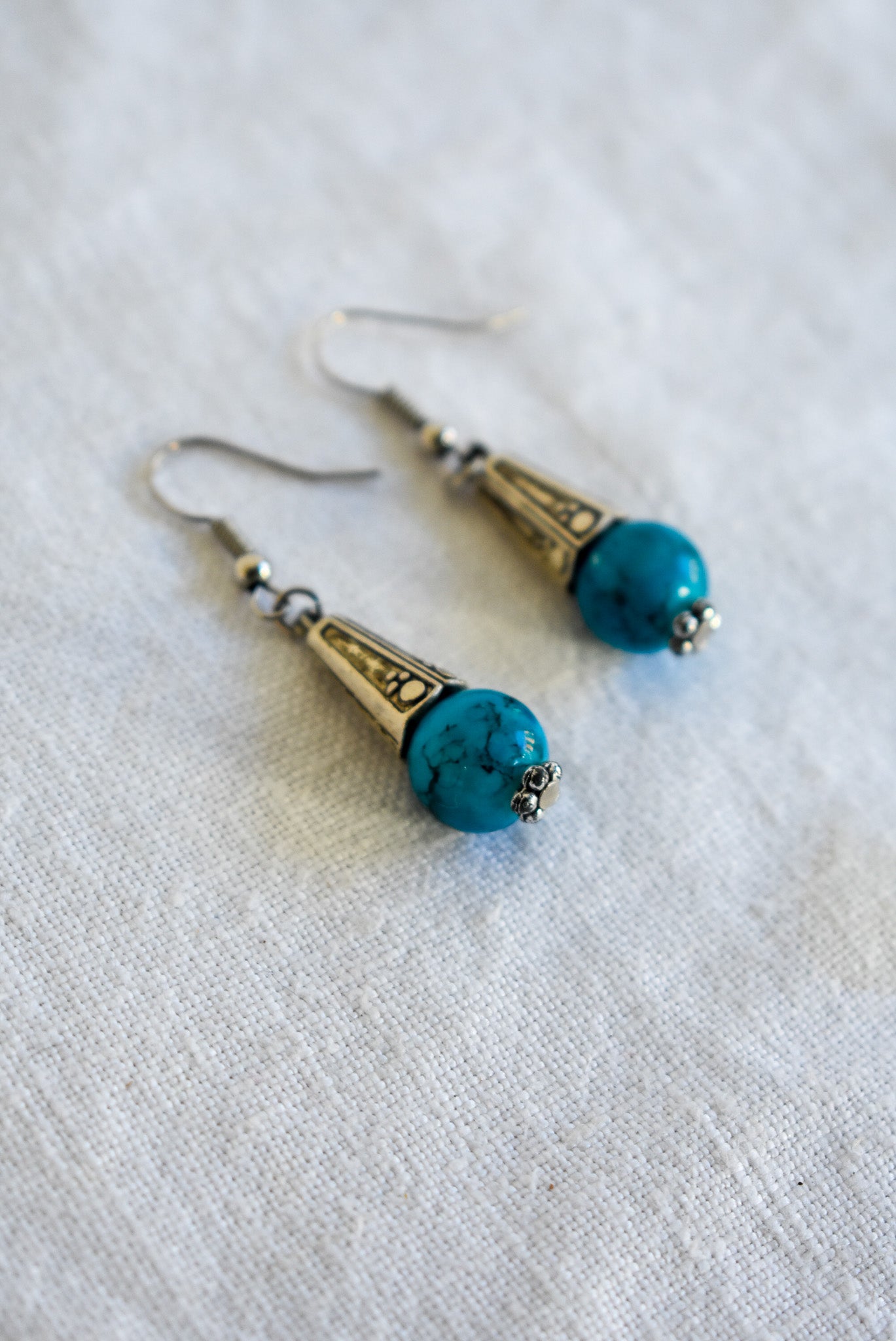 Glass bead dangly earrings