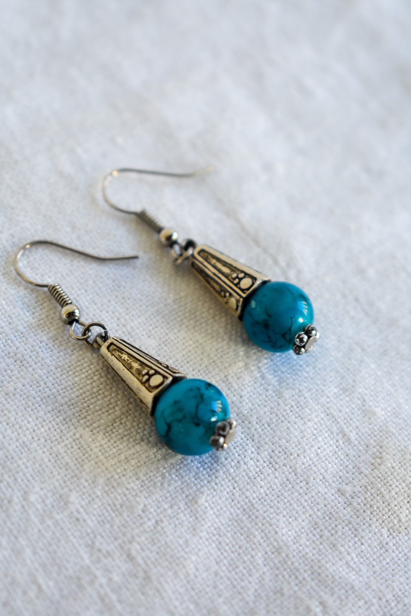 Glass bead dangly earrings