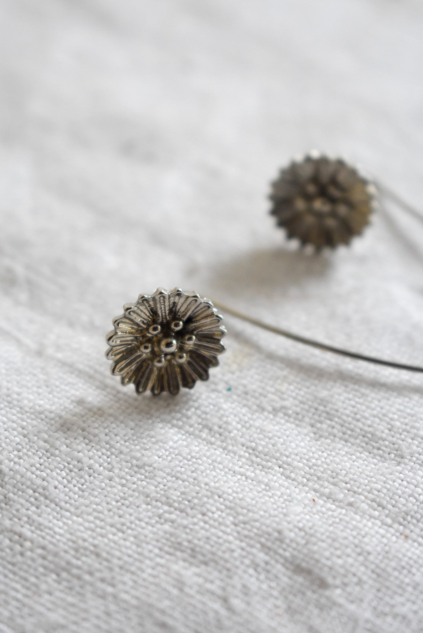 Sterling silver flower stem earrings