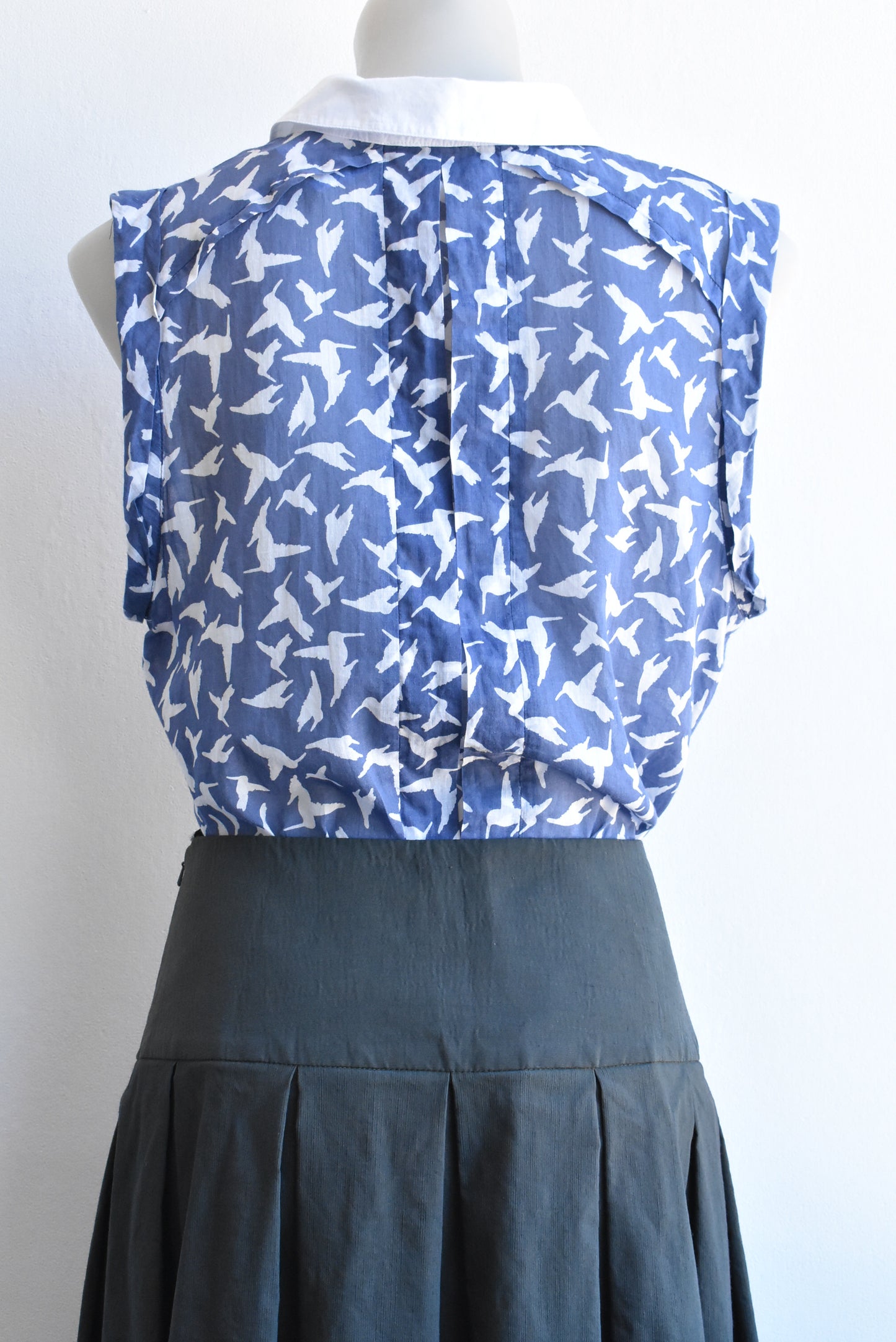 Cue In The City sleeveless bird shirt
