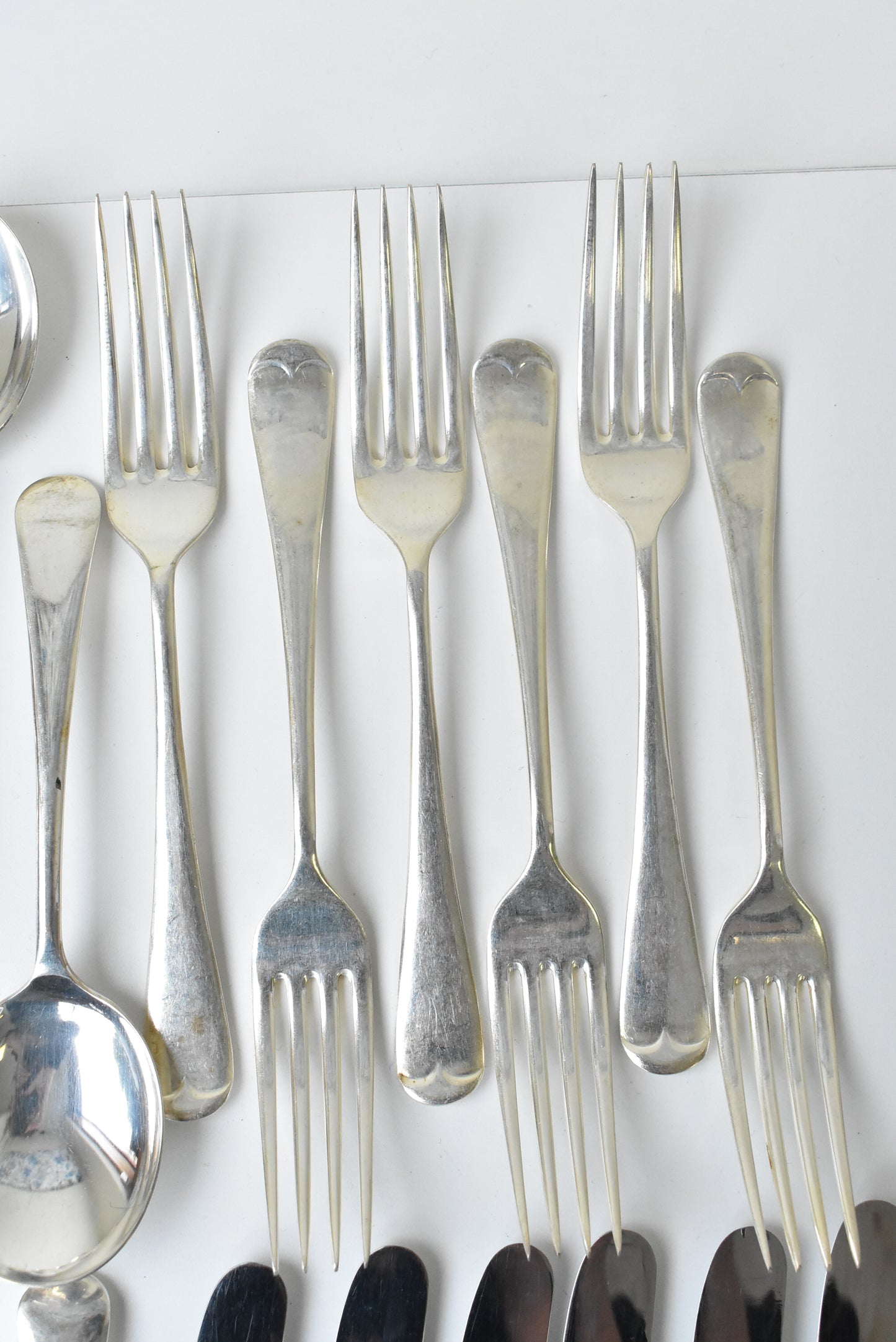 24 piece assorted set of forks, knives, dessert spoons, soup spoons