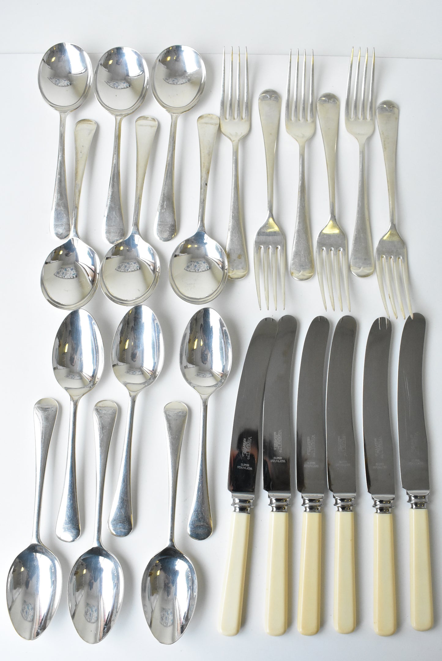 24 piece assorted set of forks, knives, dessert spoons, soup spoons