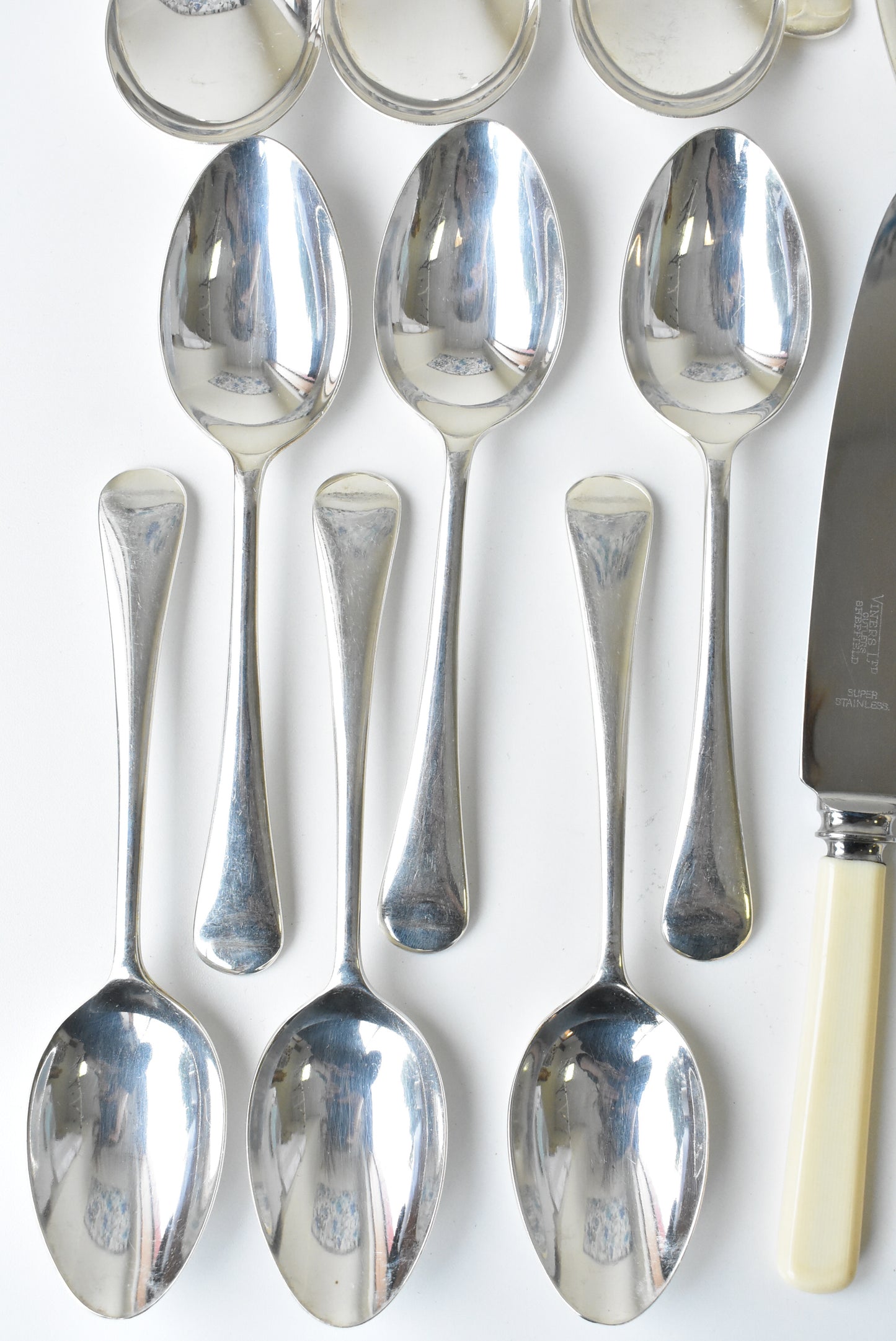 24 piece assorted set of forks, knives, dessert spoons, soup spoons