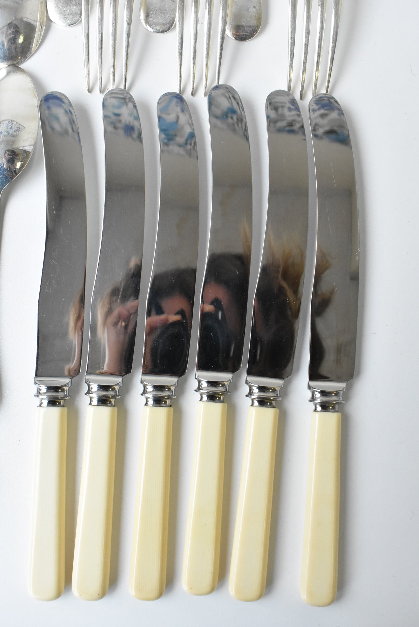 24 piece assorted set of forks, knives, dessert spoons, soup spoons
