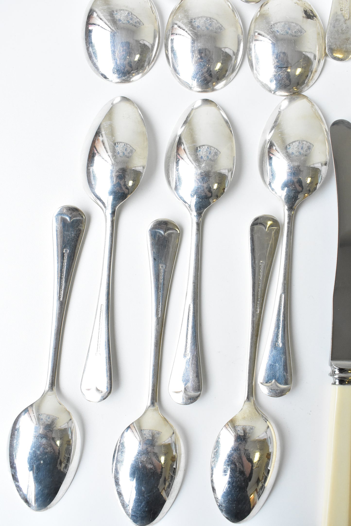 24 piece assorted set of forks, knives, dessert spoons, soup spoons