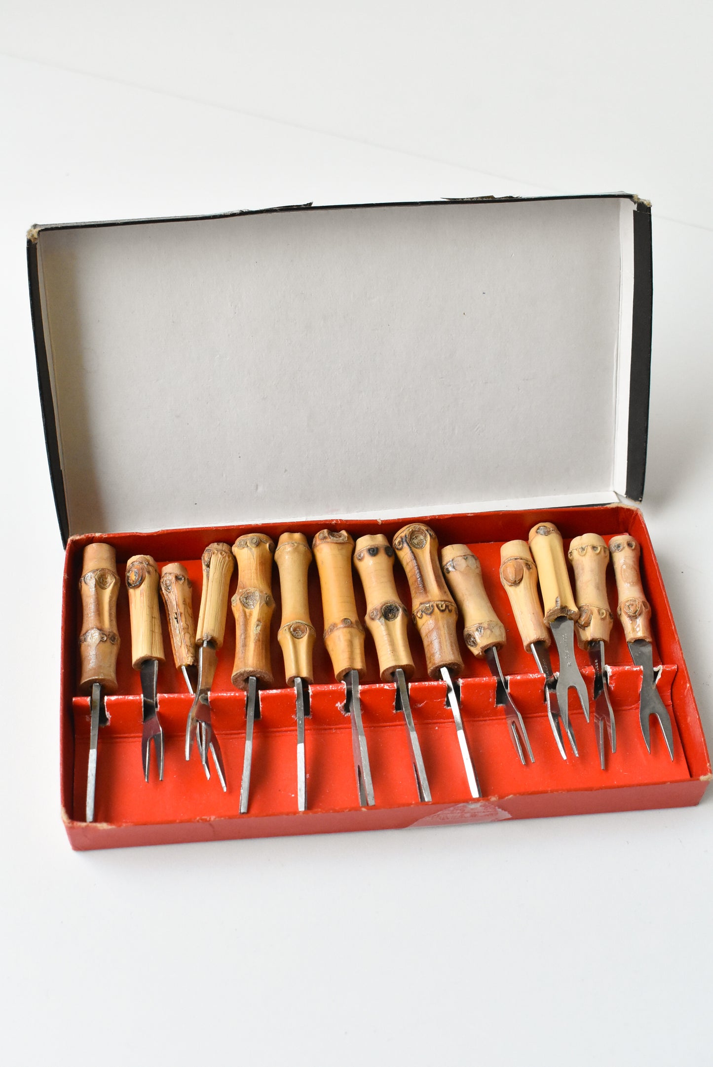 Set of stainless steel bamboo handled 1960s cocktail forks