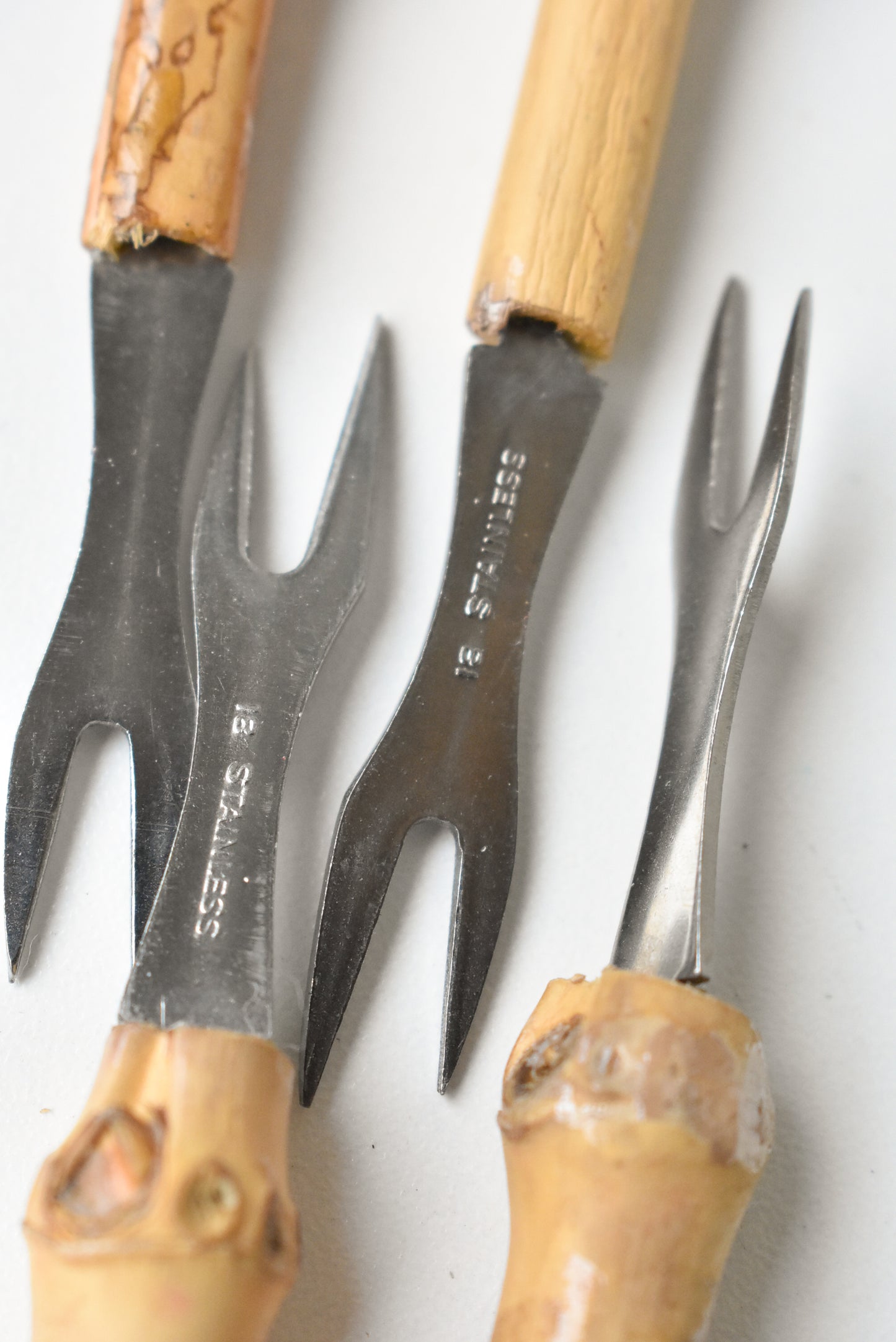 Set of stainless steel bamboo handled 1960s cocktail forks