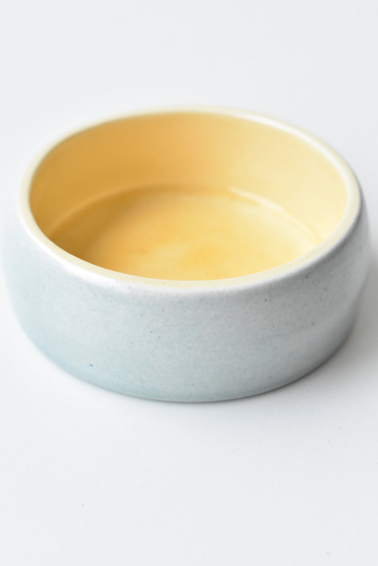O.C Stephens small yellow and blue glazed dish