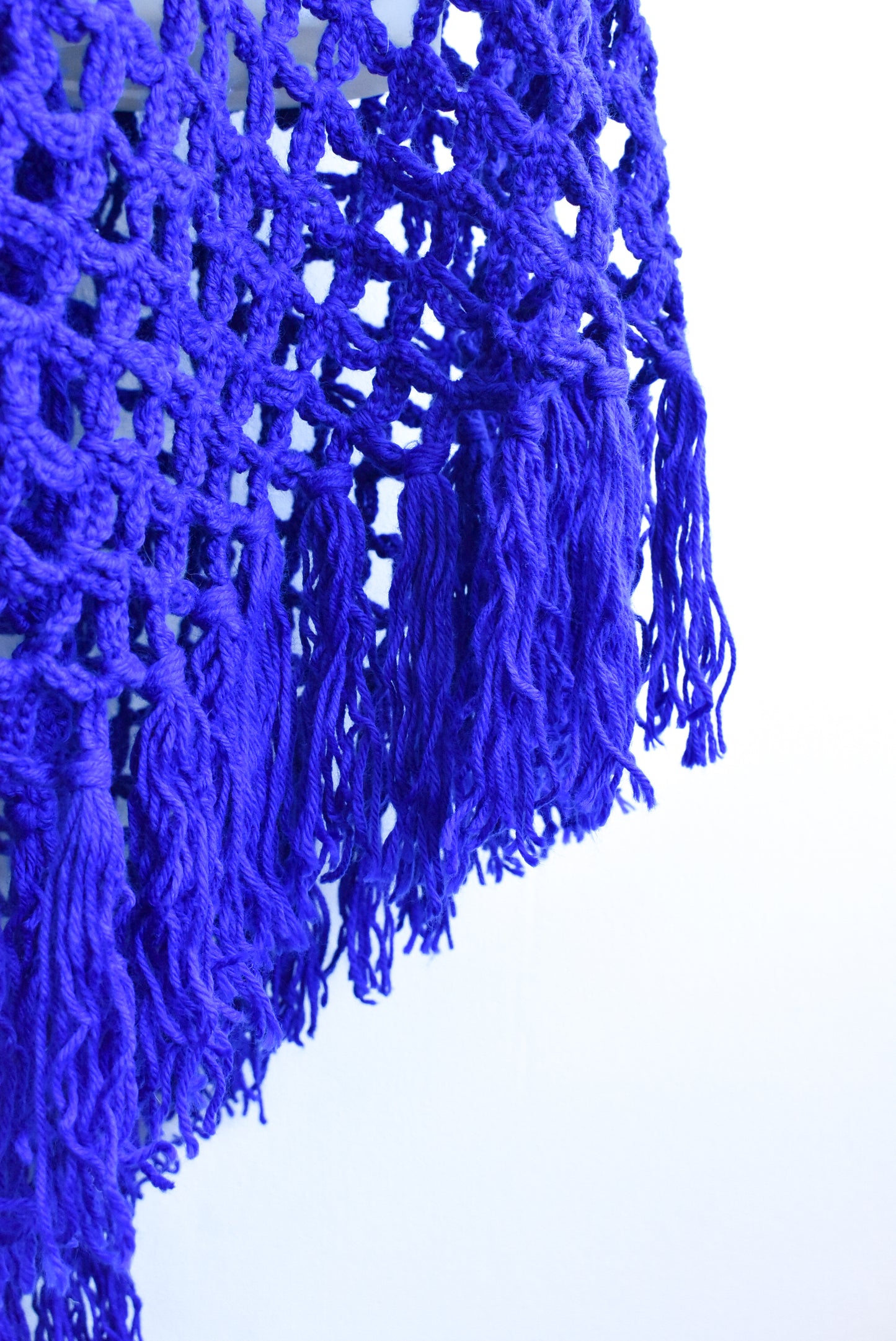 Large blue hand-crocheted shawl