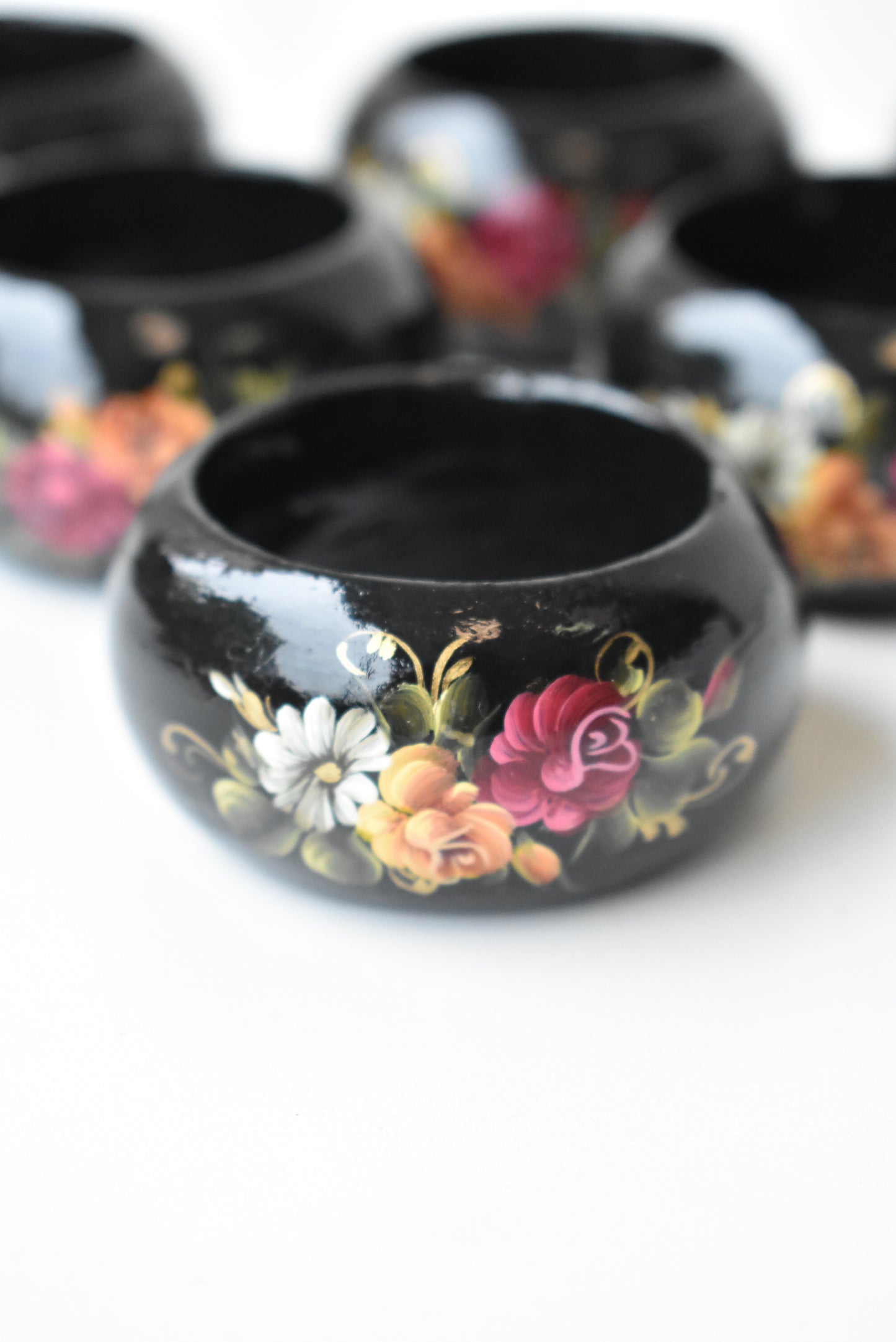 Hand painted and lacquered napkin rings