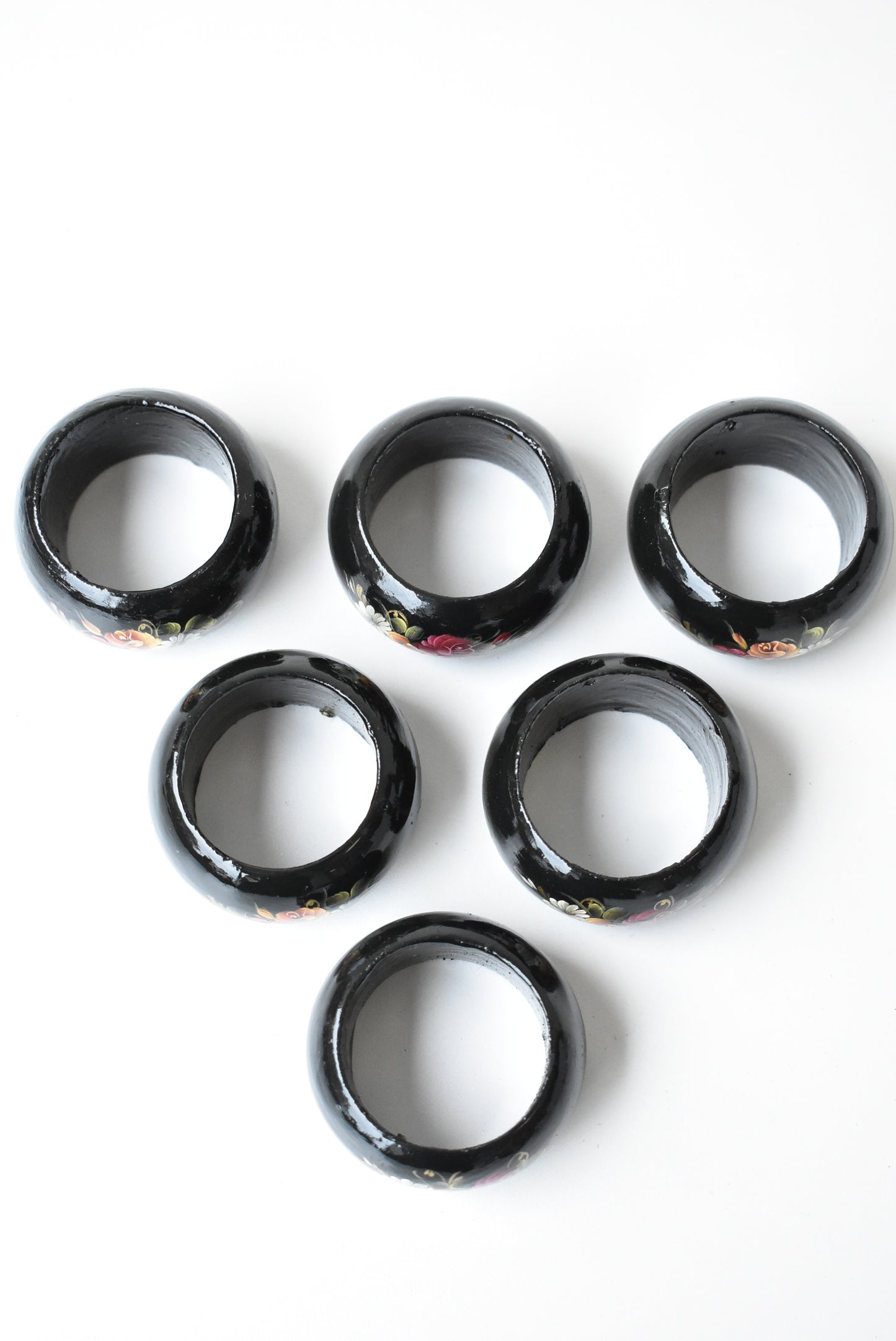 Hand painted and lacquered napkin rings