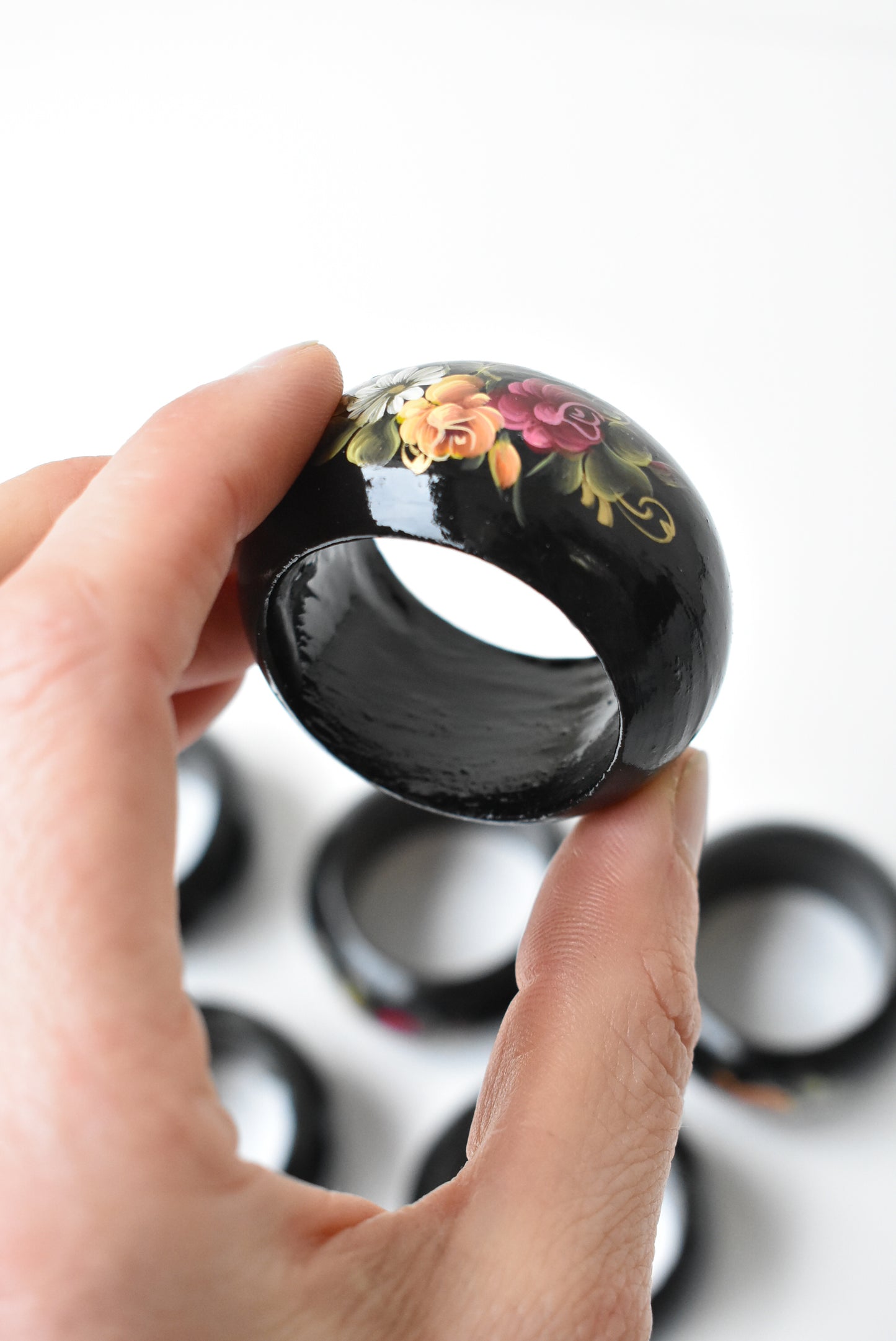 Hand painted and lacquered napkin rings