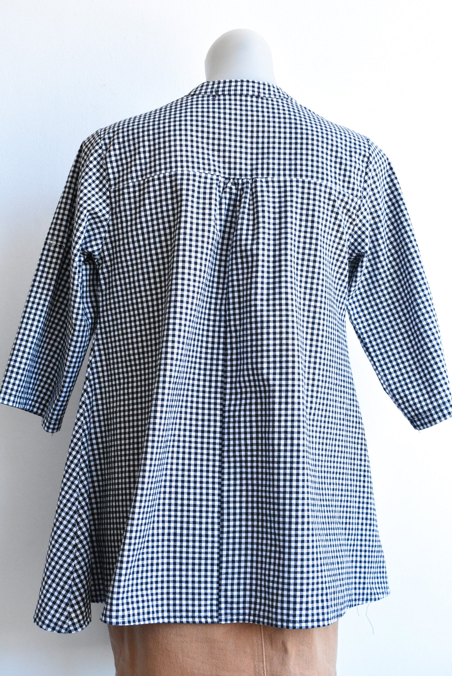 Black and white checked top, size XL