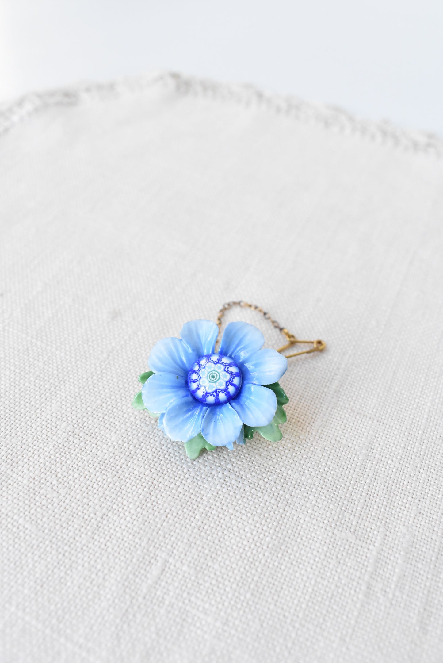 Crown English China and glass blue flower brooch