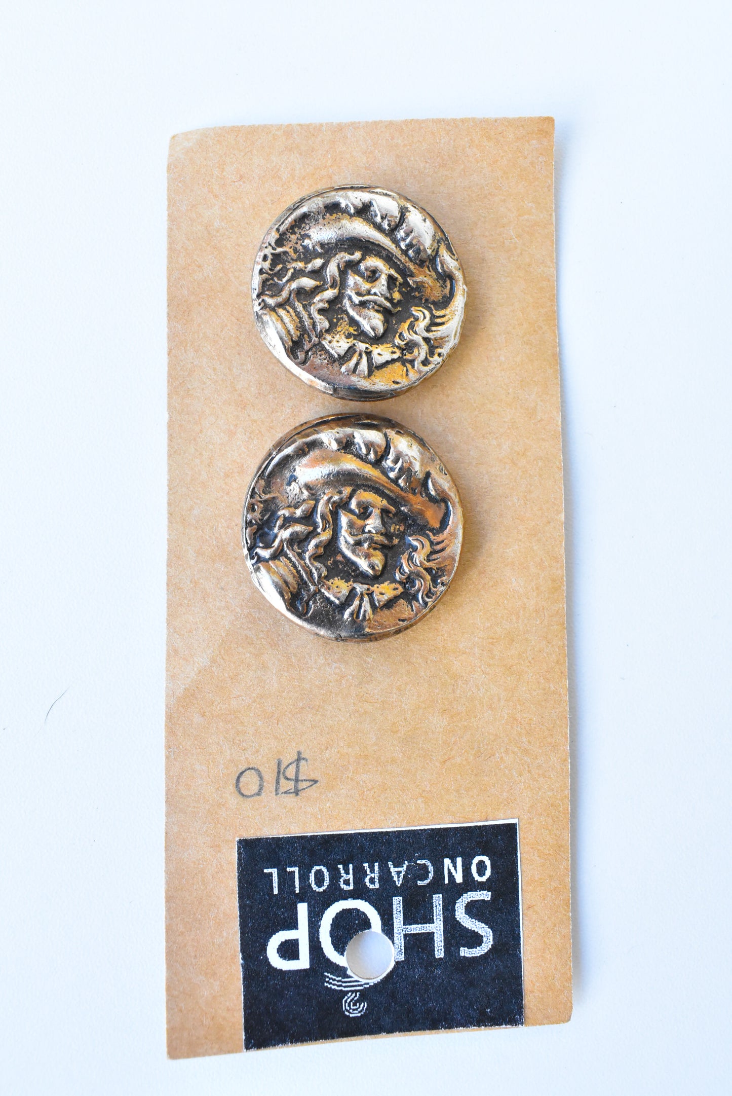 Gold-toned metal musketeer buttons x2