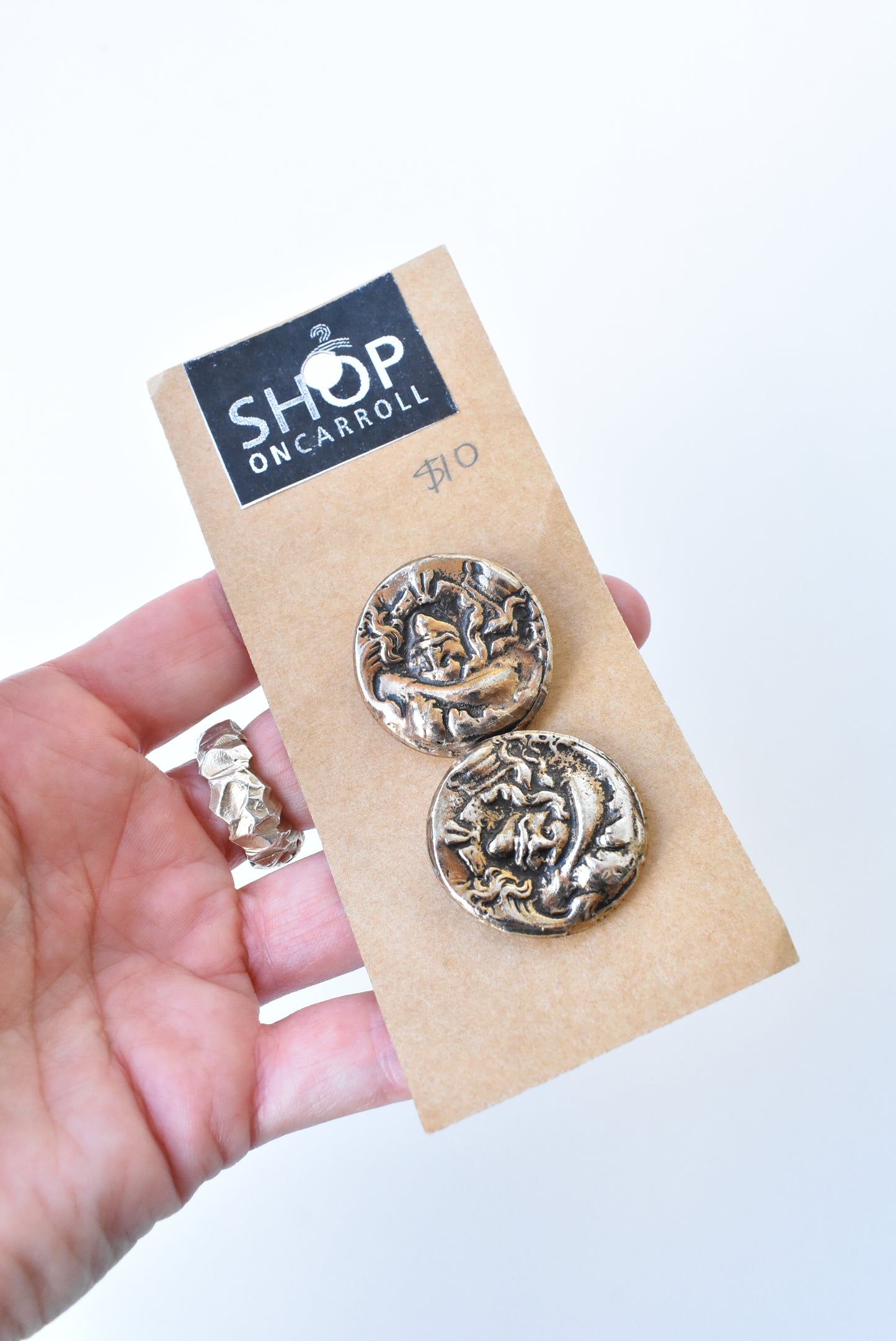 Gold-toned metal musketeer buttons x2