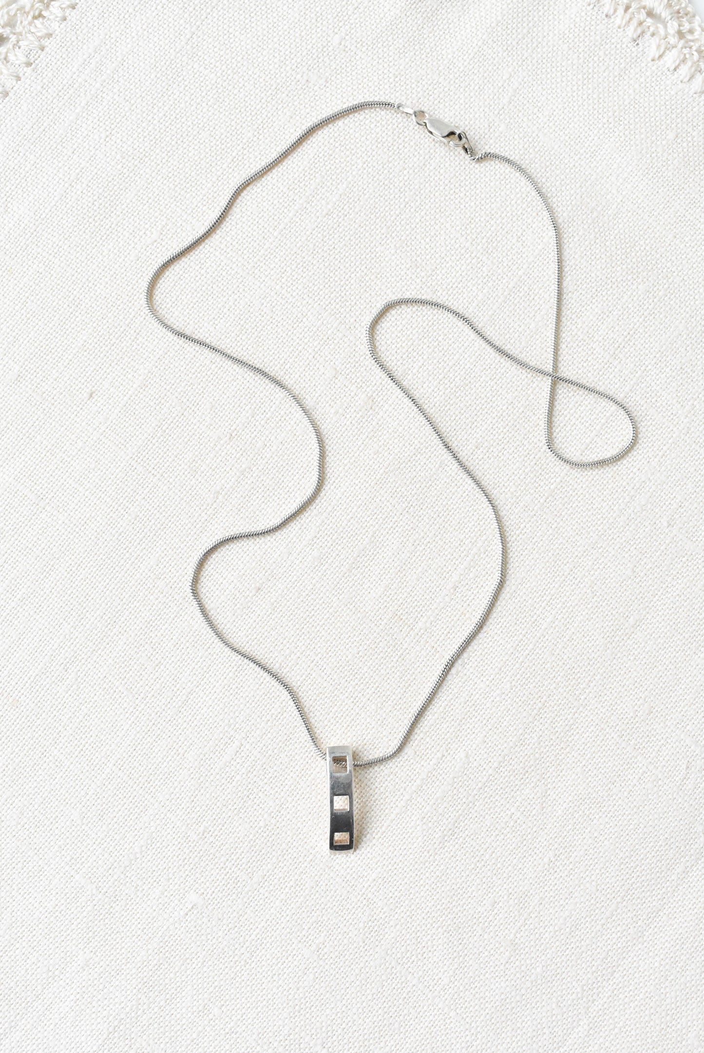 Sterling silver curving pendant necklace