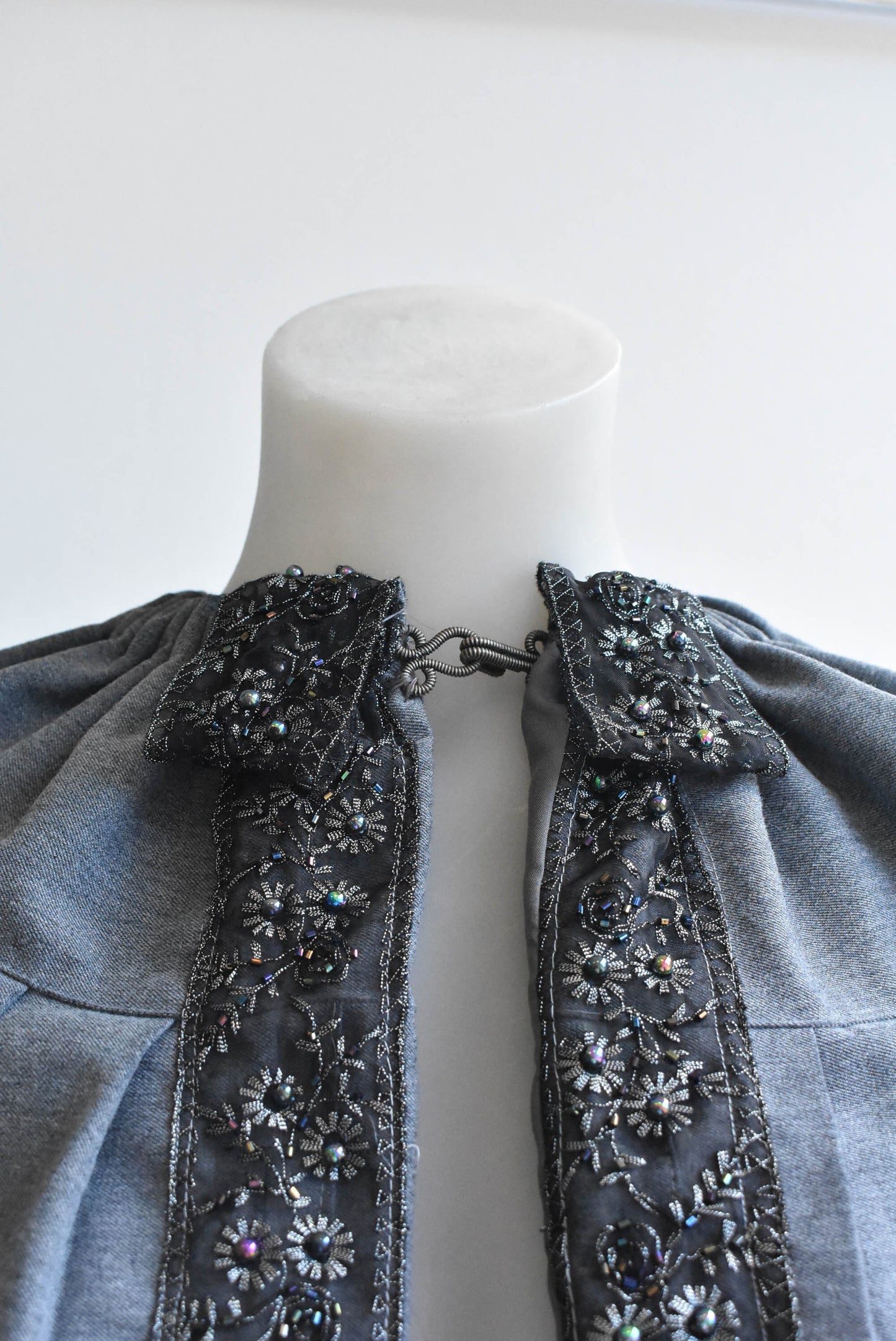 Grey beaded cape