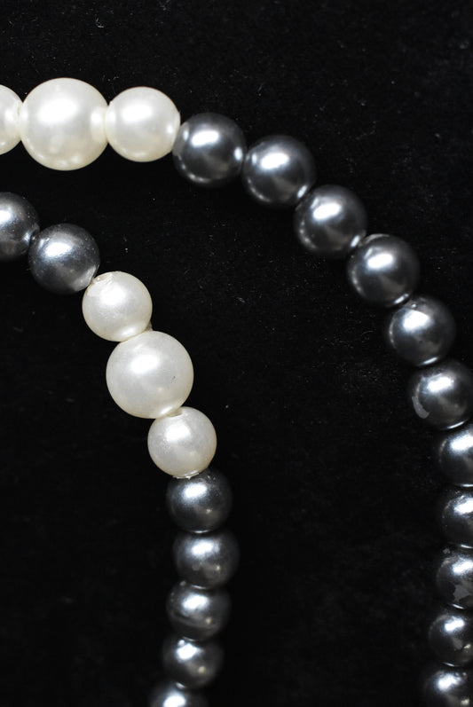 Plastic pearl beads.