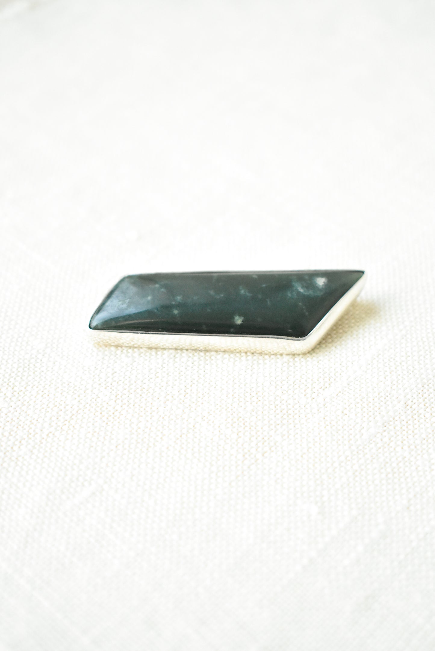 Bob Wyber 925 silver and pounamu greenstone trapezium brooch
