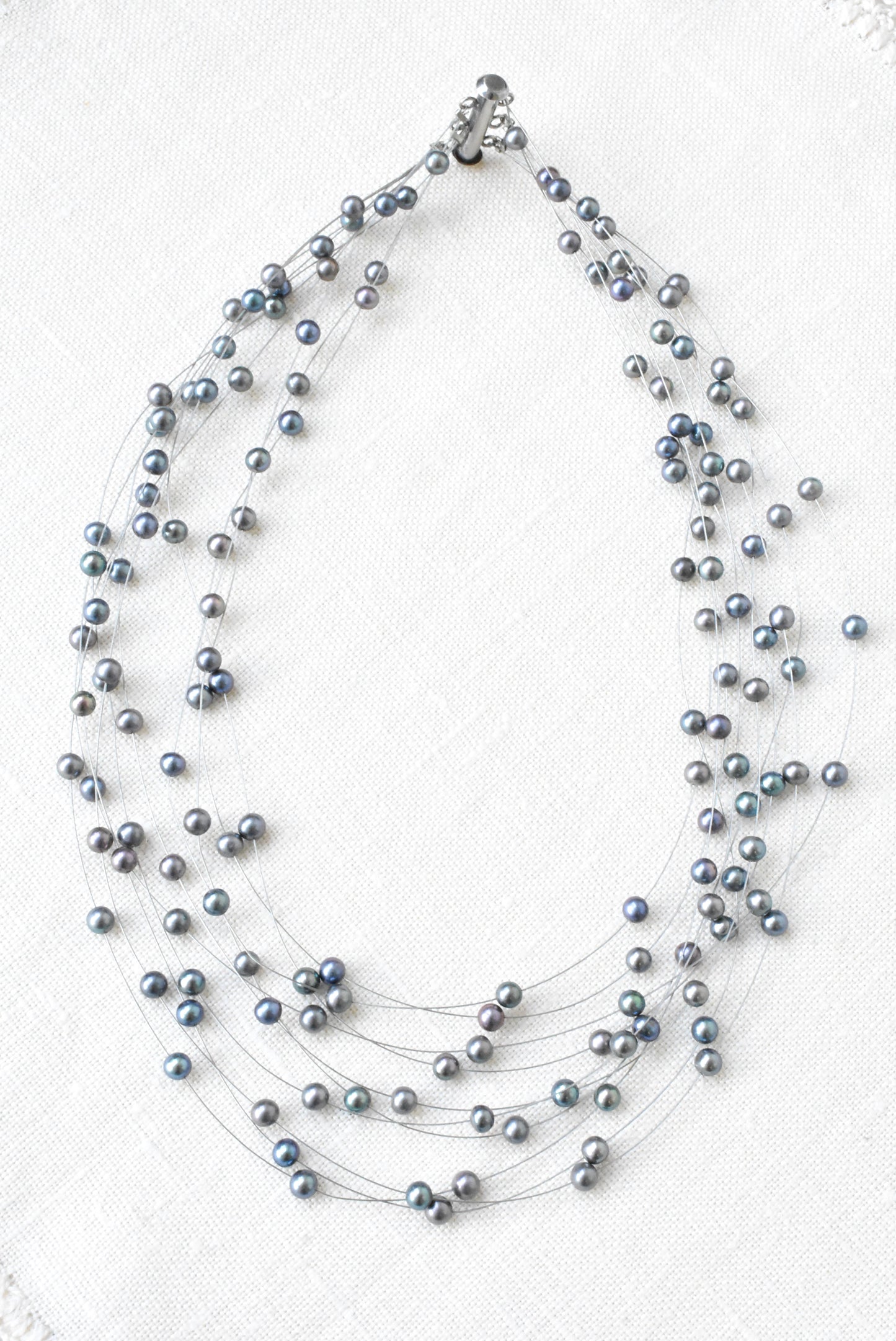 Cultured black pearl princess style multi strand necklace