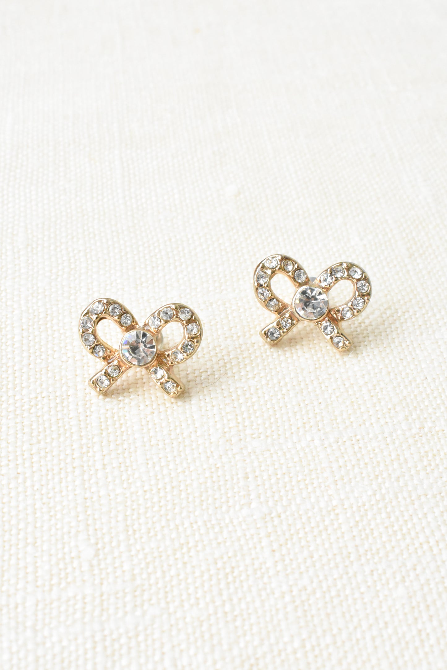 Diamanté gold bow earrings