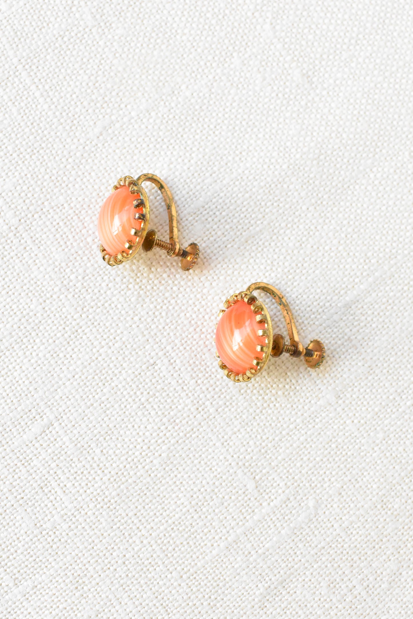 Vintage screw-on earrings with orange domes
