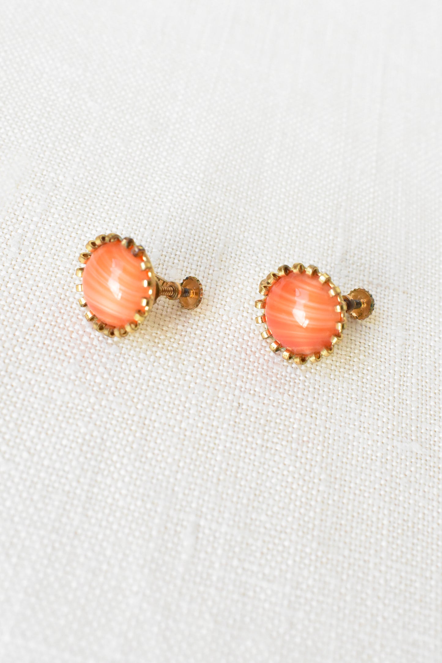 Vintage screw-on earrings with orange domes