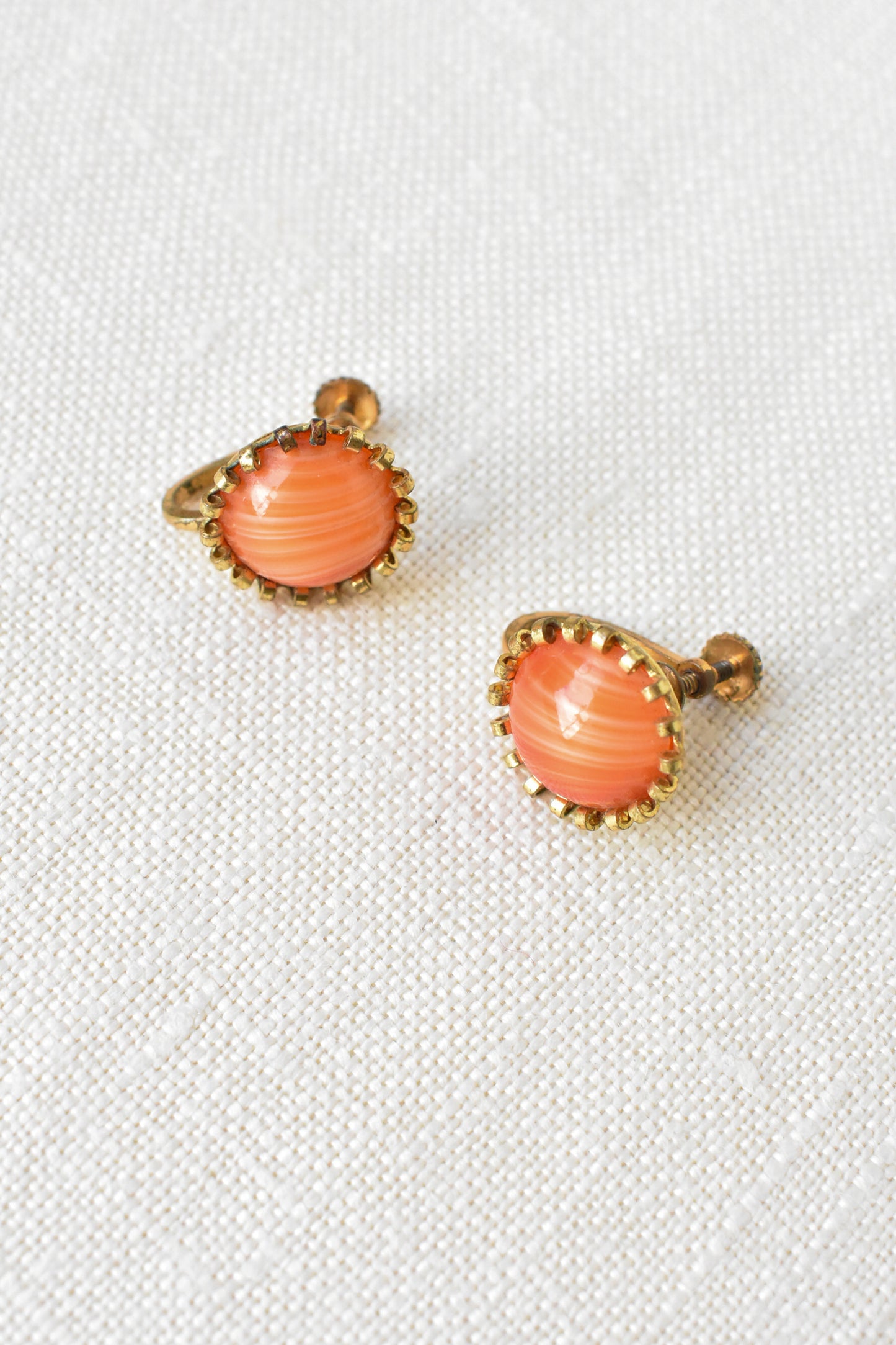 Vintage screw-on earrings with orange domes