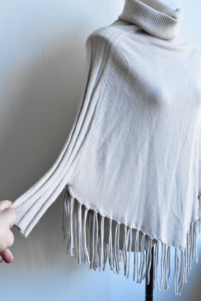 Isle of Mine beige fringed turtleneck poncho top