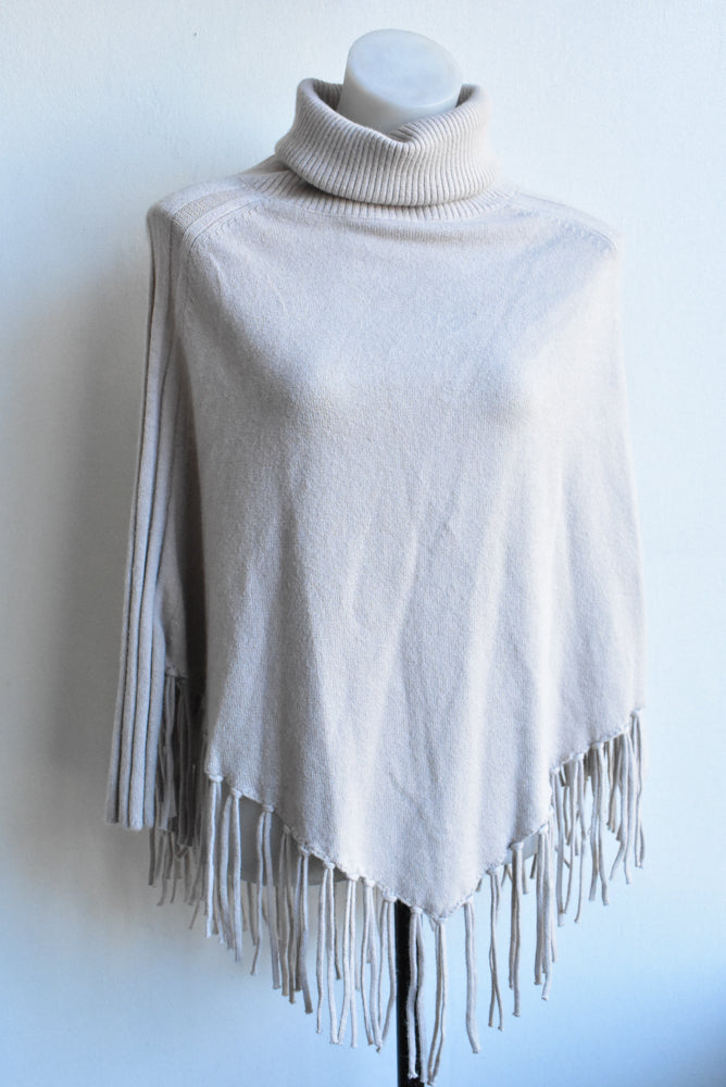 Isle of Mine beige fringed turtleneck poncho top