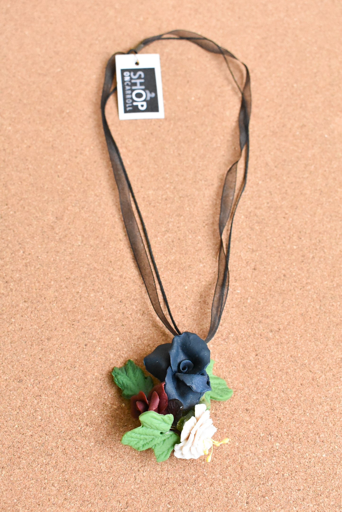 Ceramic flower ribbon necklace with large blue and white flowers