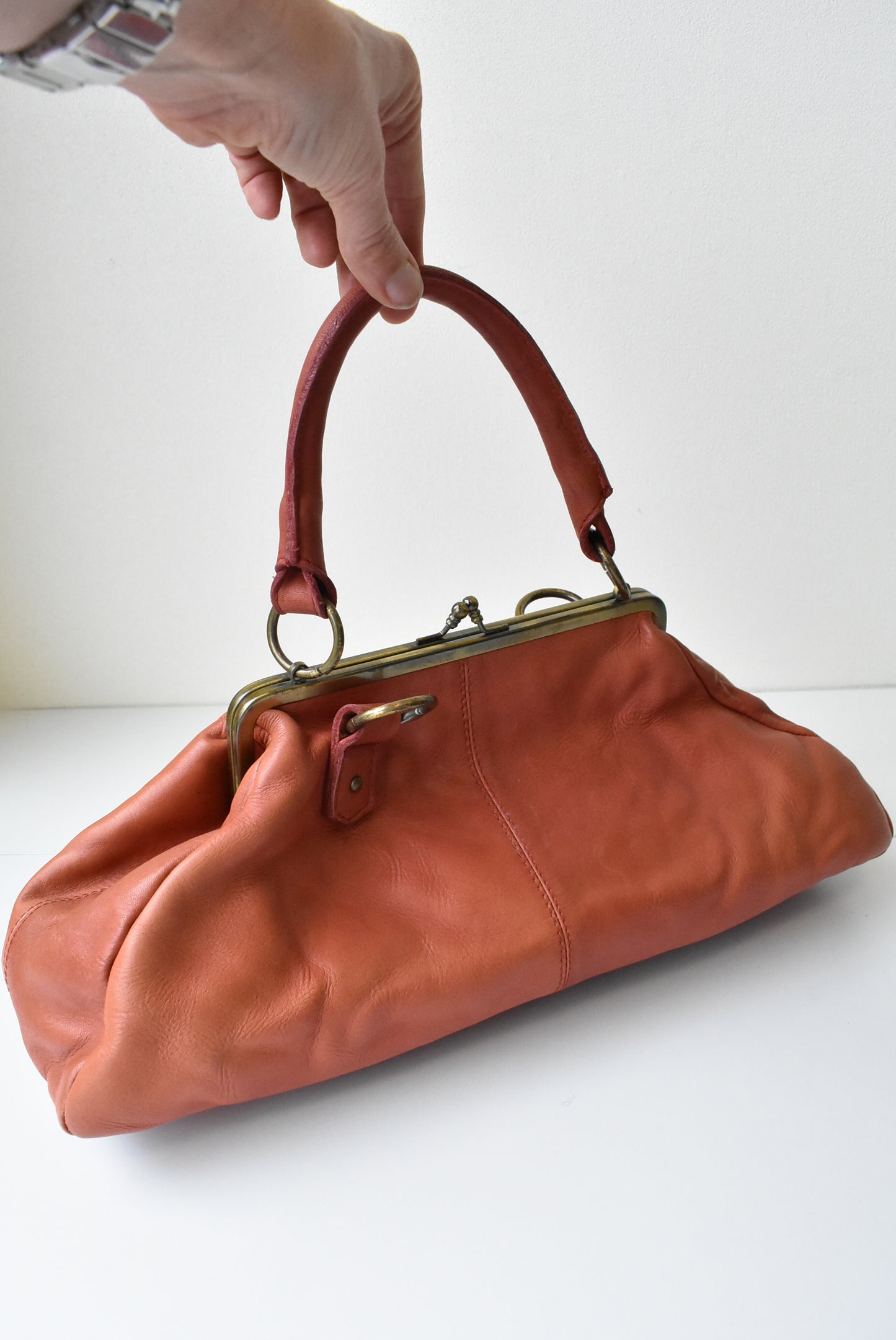 Leather orange frame bag handbag