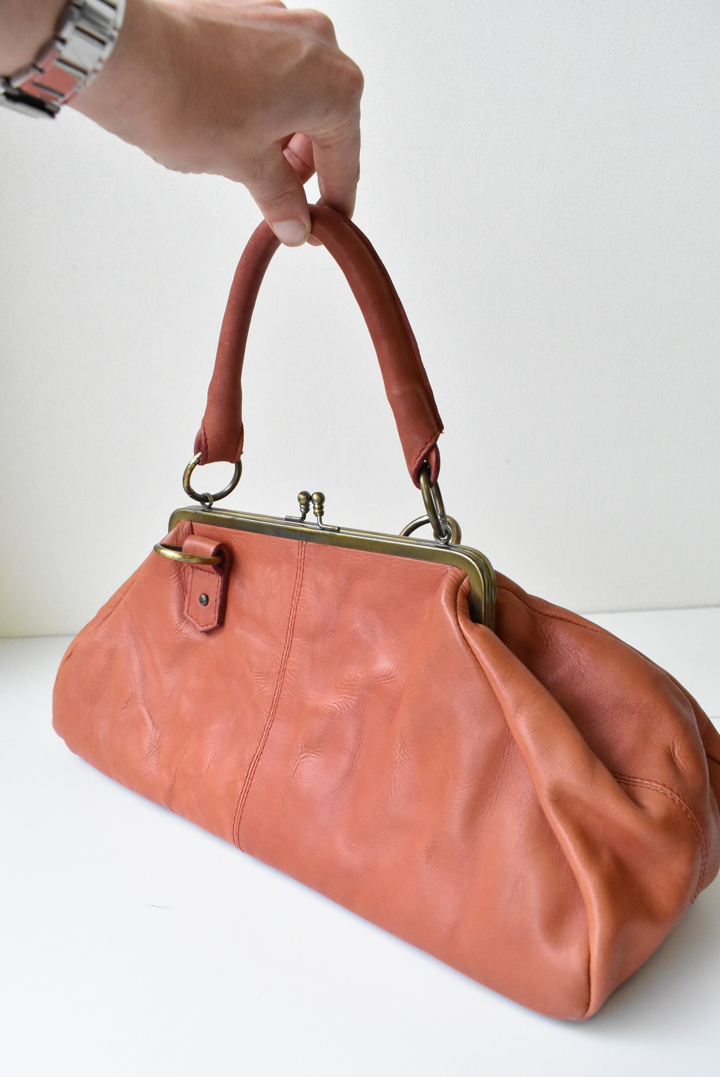 Leather orange frame bag handbag
