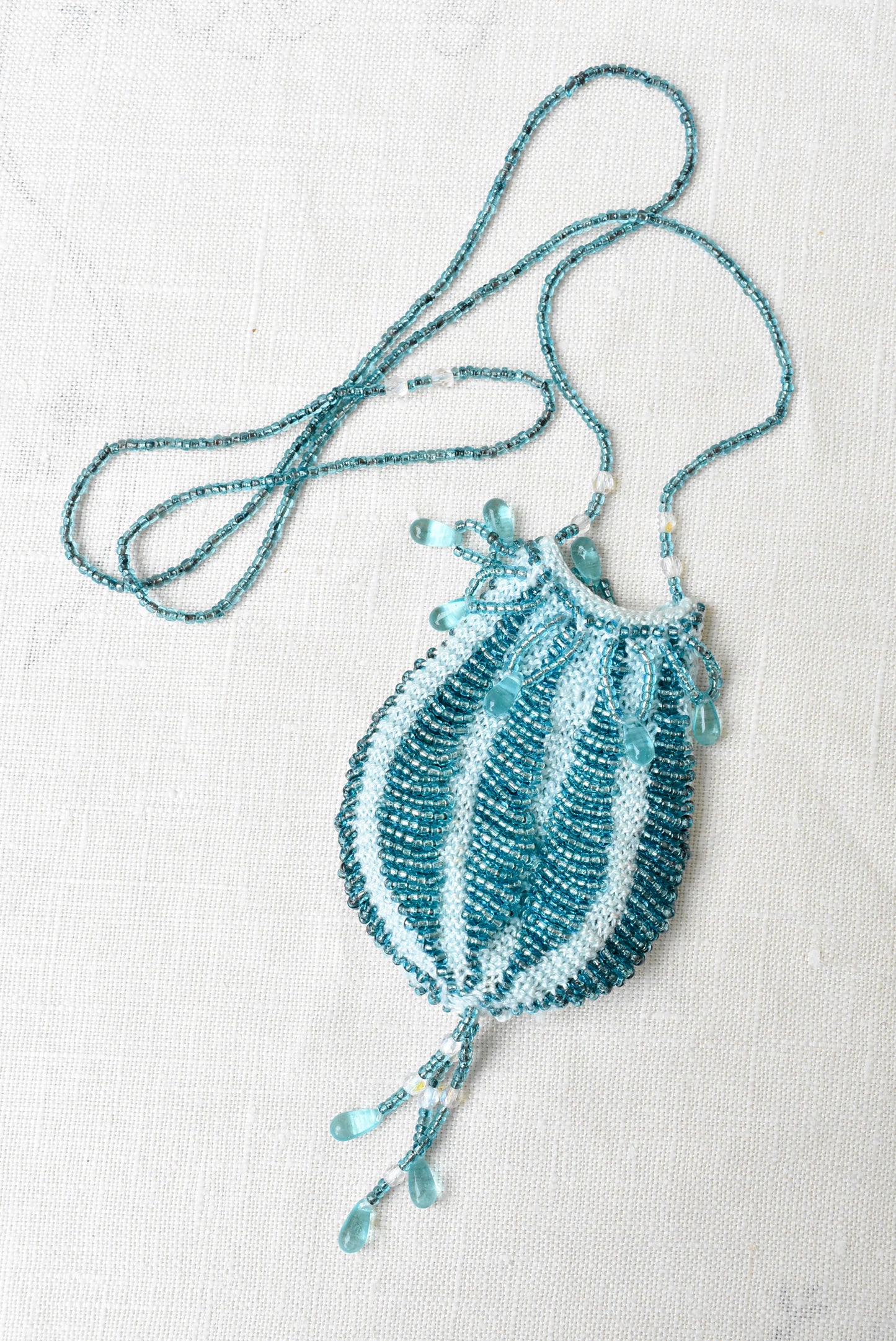 Blue beaded mesh pouch