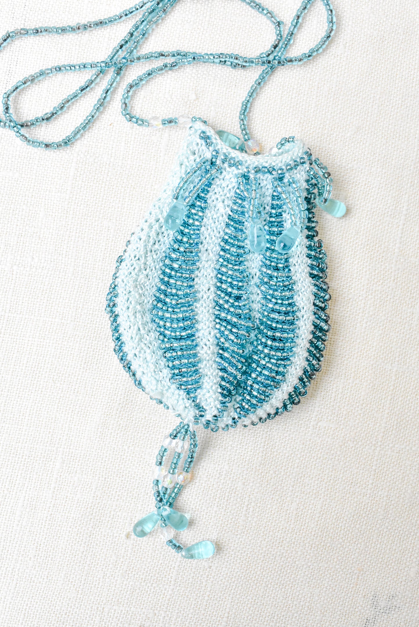 Blue beaded mesh pouch